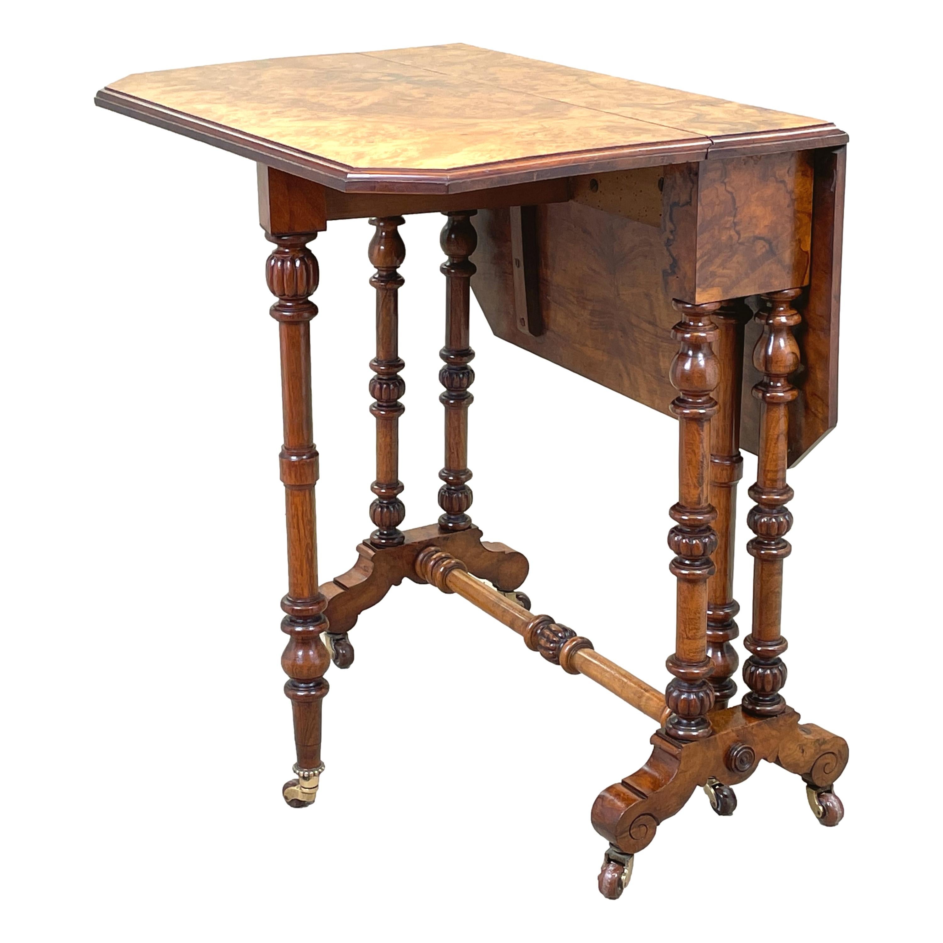 A very good quality 19th century Victorian burr walnut
Sutherland table having superbly figured two drop flap
top raised on elegant turned & carved upright supports
terminating with original brass castors

(The term “Sutherland Table” is
