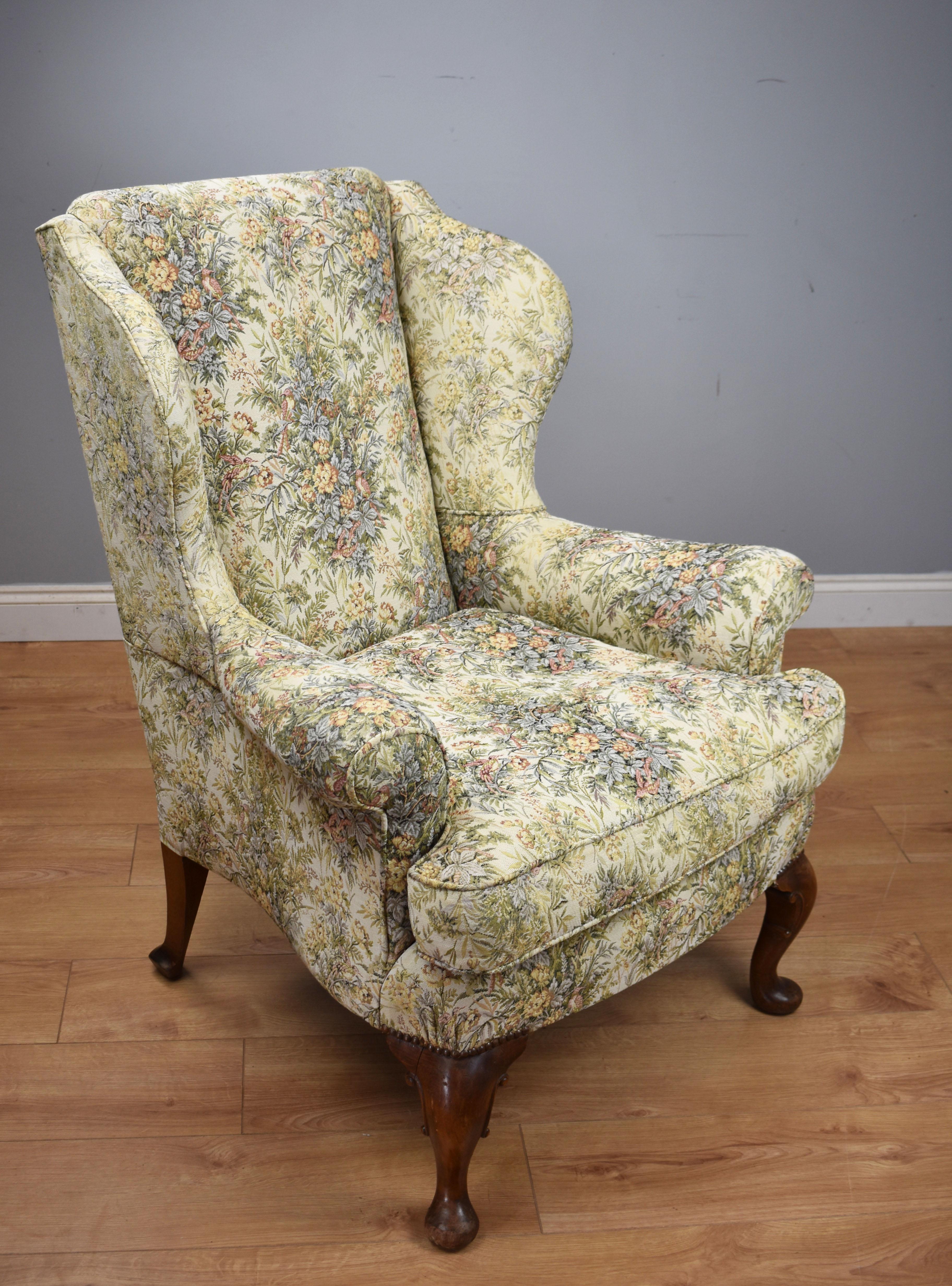 For sale is a good quality 19th century Victorian walnut framed wing back armchair. Upholstered in a floral fabric, standing on squat cabriole legs, the chair is in good condition, being structurally sound and the upholstery being in good
