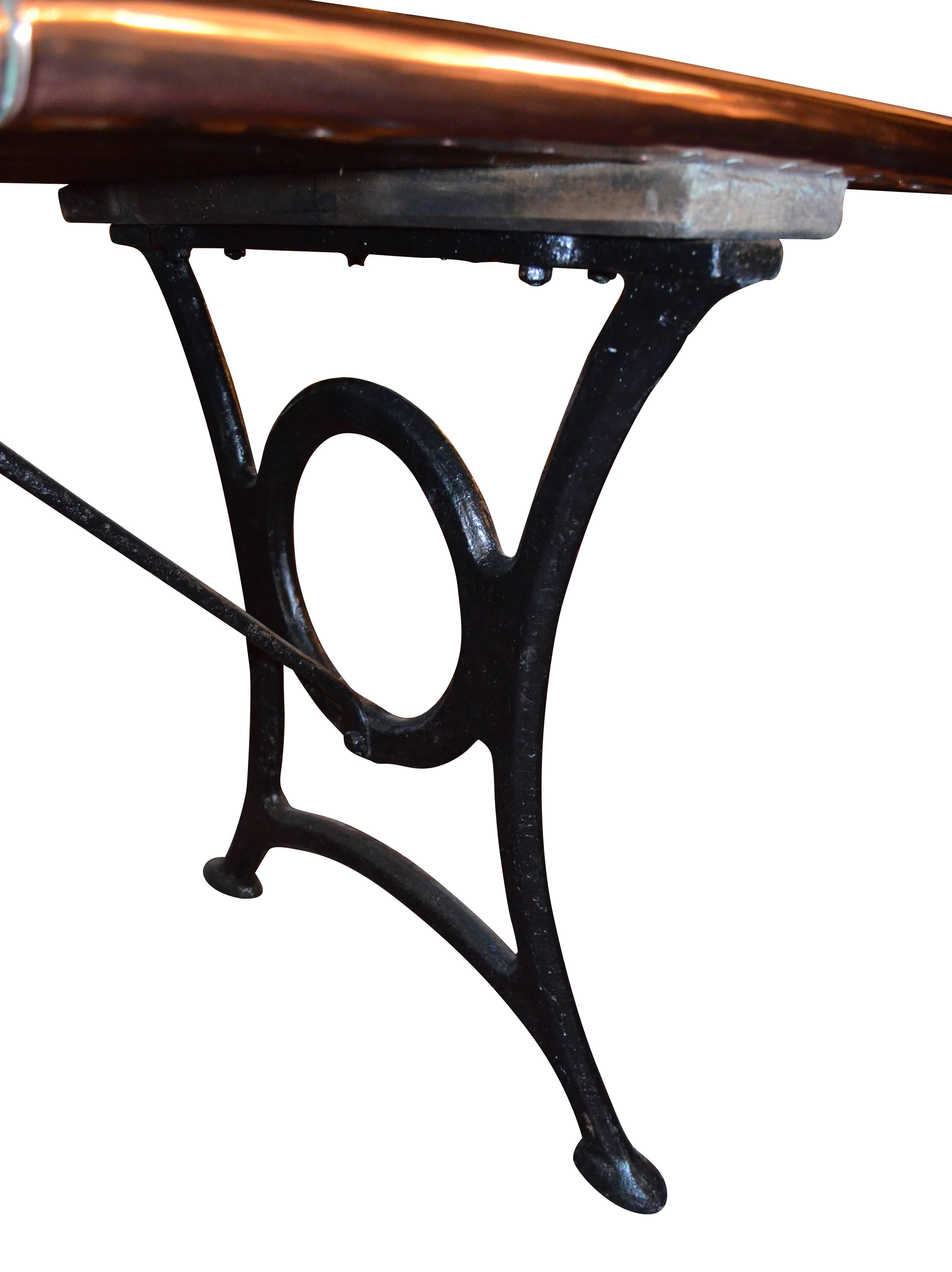 19th century Victorian wrought iron and polished copper table, circa 1880, English.