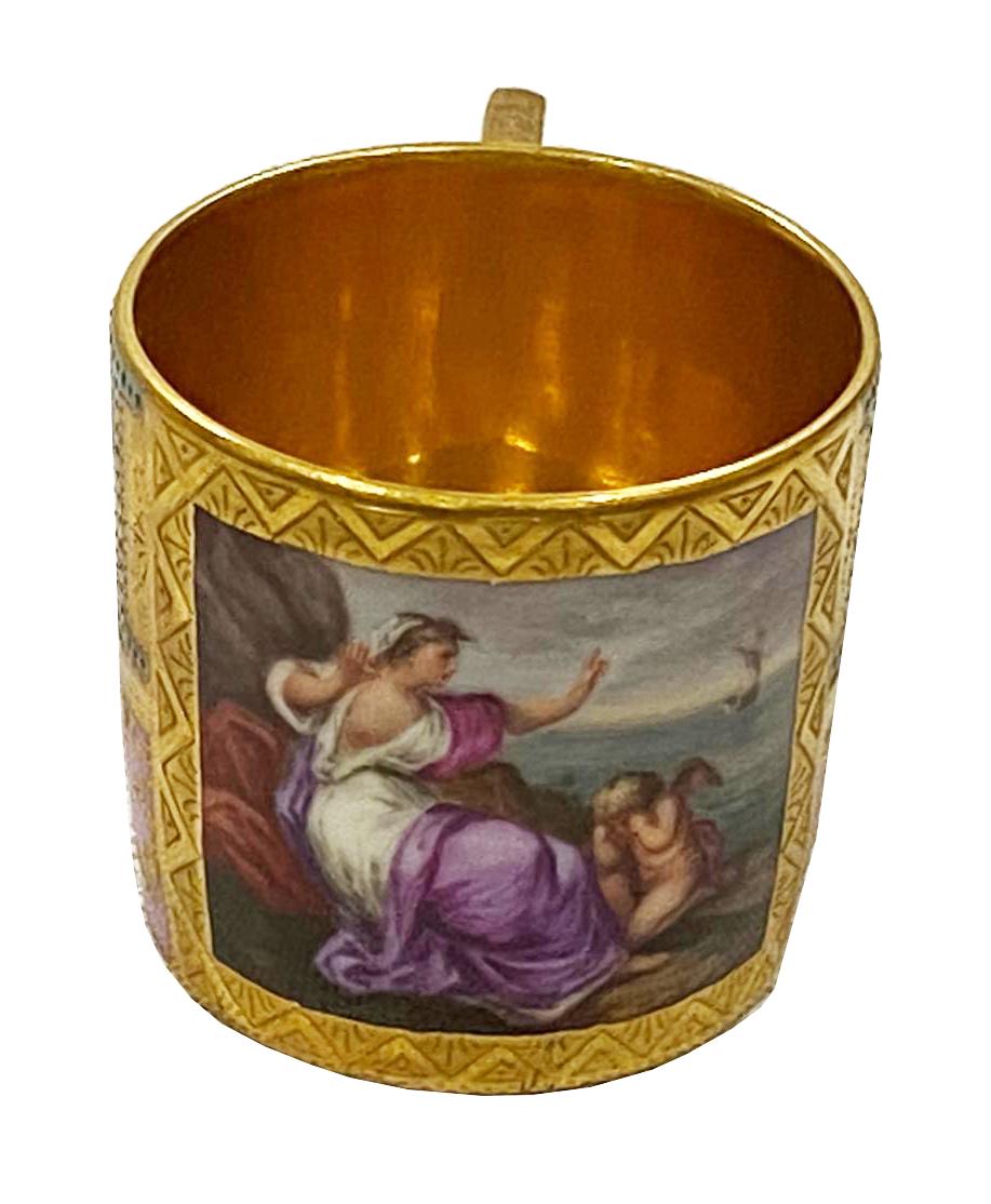 A fine quality late 19th century Vienna porcelain cup and saucer. Having wonderful classical scrolling hand painted and gilded motifs decoration, an inset painted panel depicting Ariadne.

Ariadne was the daughter of King Minos of Crete and his