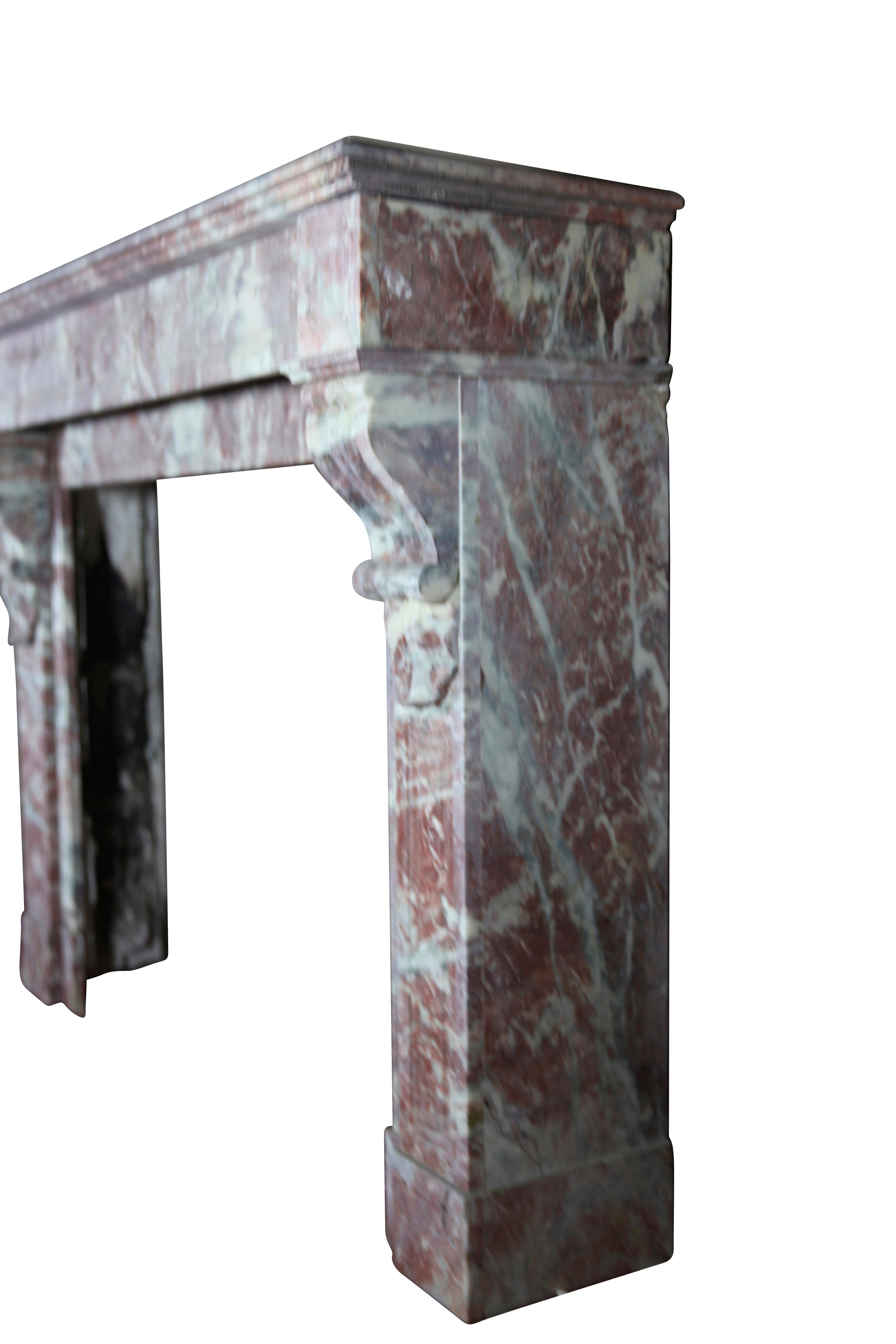 A fine Belgian antique fireplace mantel in a special color marble. 
This small chimney piece is of the Louis Philippe period, early 19th century.
A decorative element for elegant interior decor.
Measures:
140 cm Exterior Width 55.12 Inch
107 cm