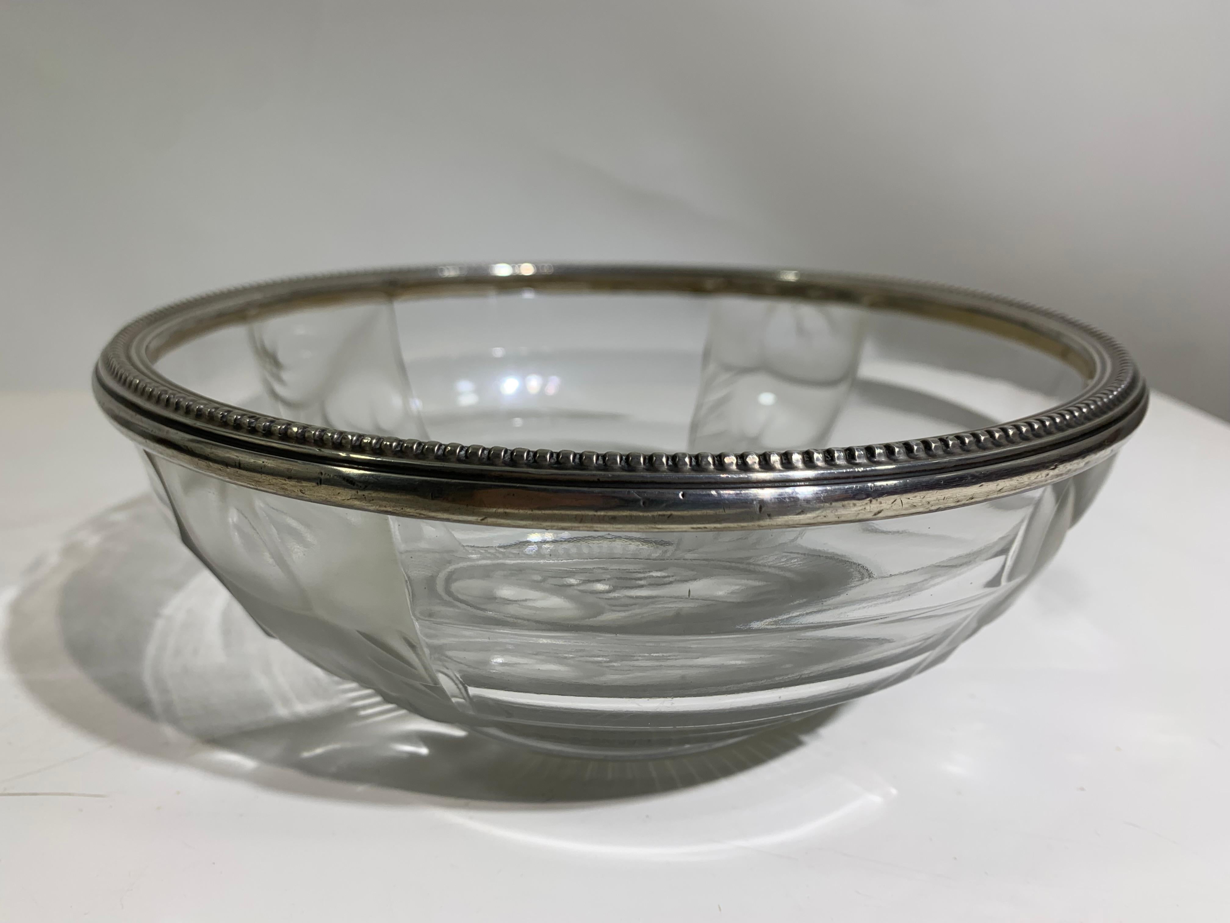 Vintage Crystal fruit / serving bowl in fruits and flowers patterns , diverging between opaque and transparent parts of the glass,  with a silver rim circulating the top stamped and a signature on the bottom part of glass signed 
