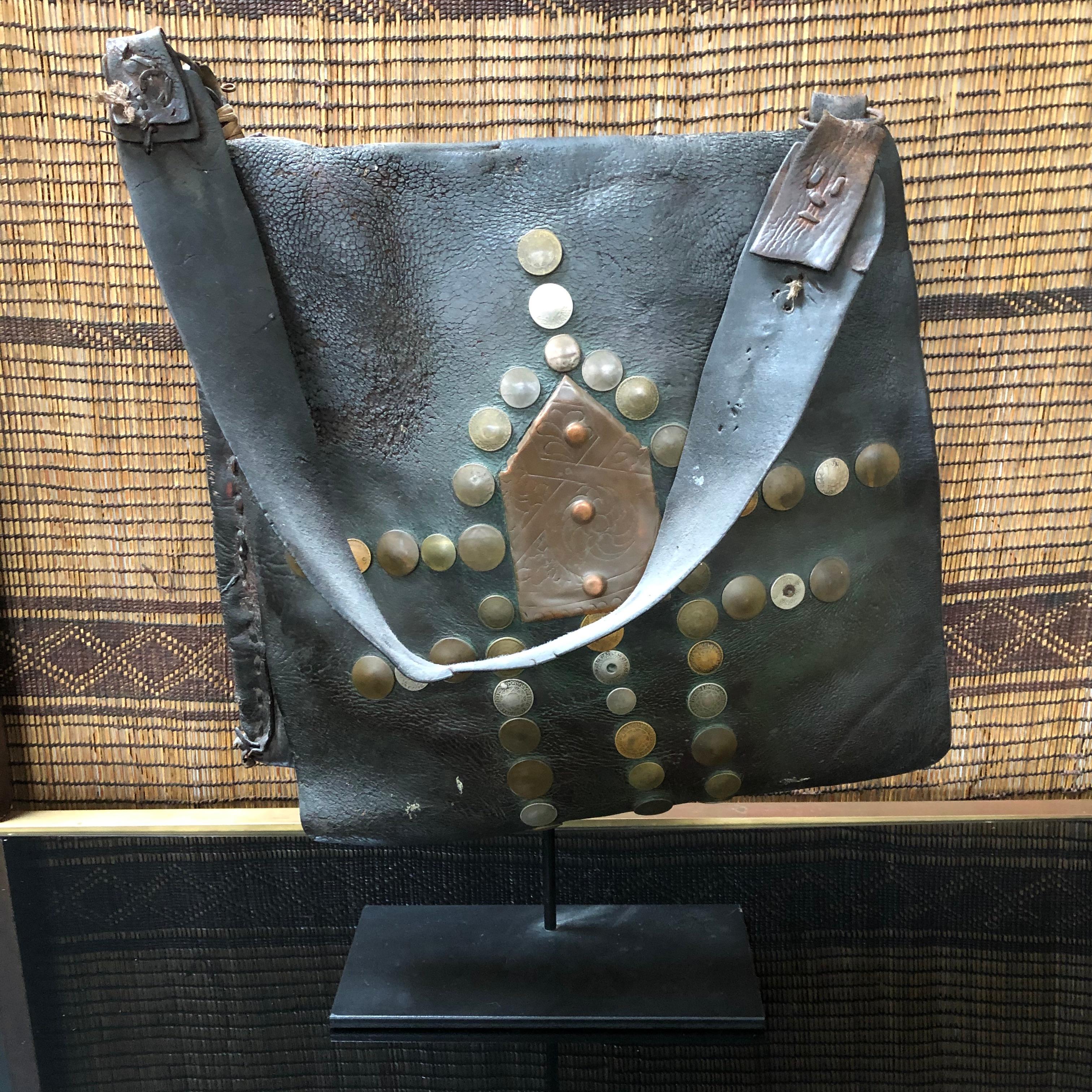 19th Century Vintage Moroccan Leather Water Carrier Bag on a Stand In Fair Condition For Sale In Sausalito, CA