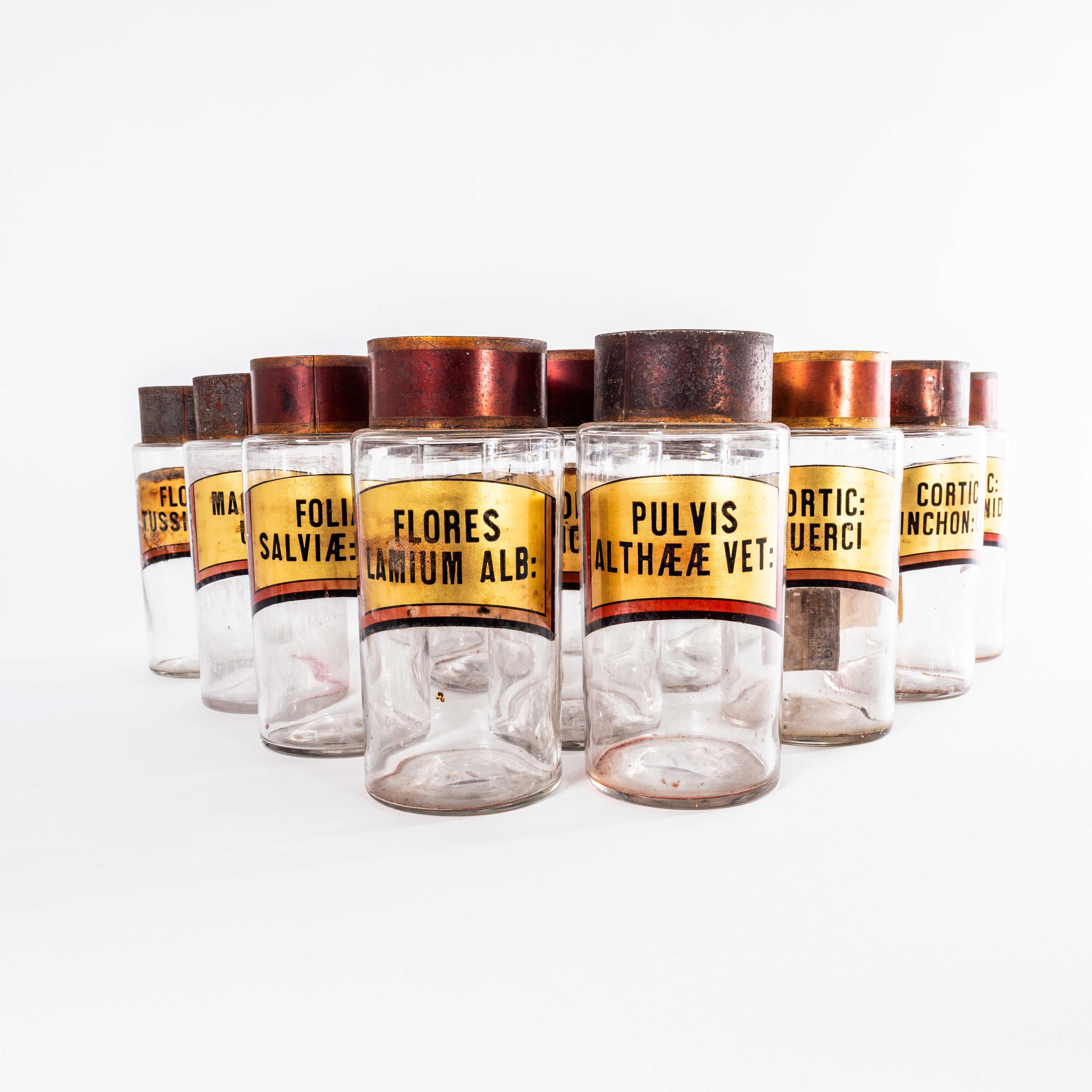 19th Century Vintage Pharmacy Jars French (Large Lid). 
Extremely rare to have such a large quantity of these totally original French pharmacy glass containers. The jars are individually mouth blown glass retaining their original contents labels