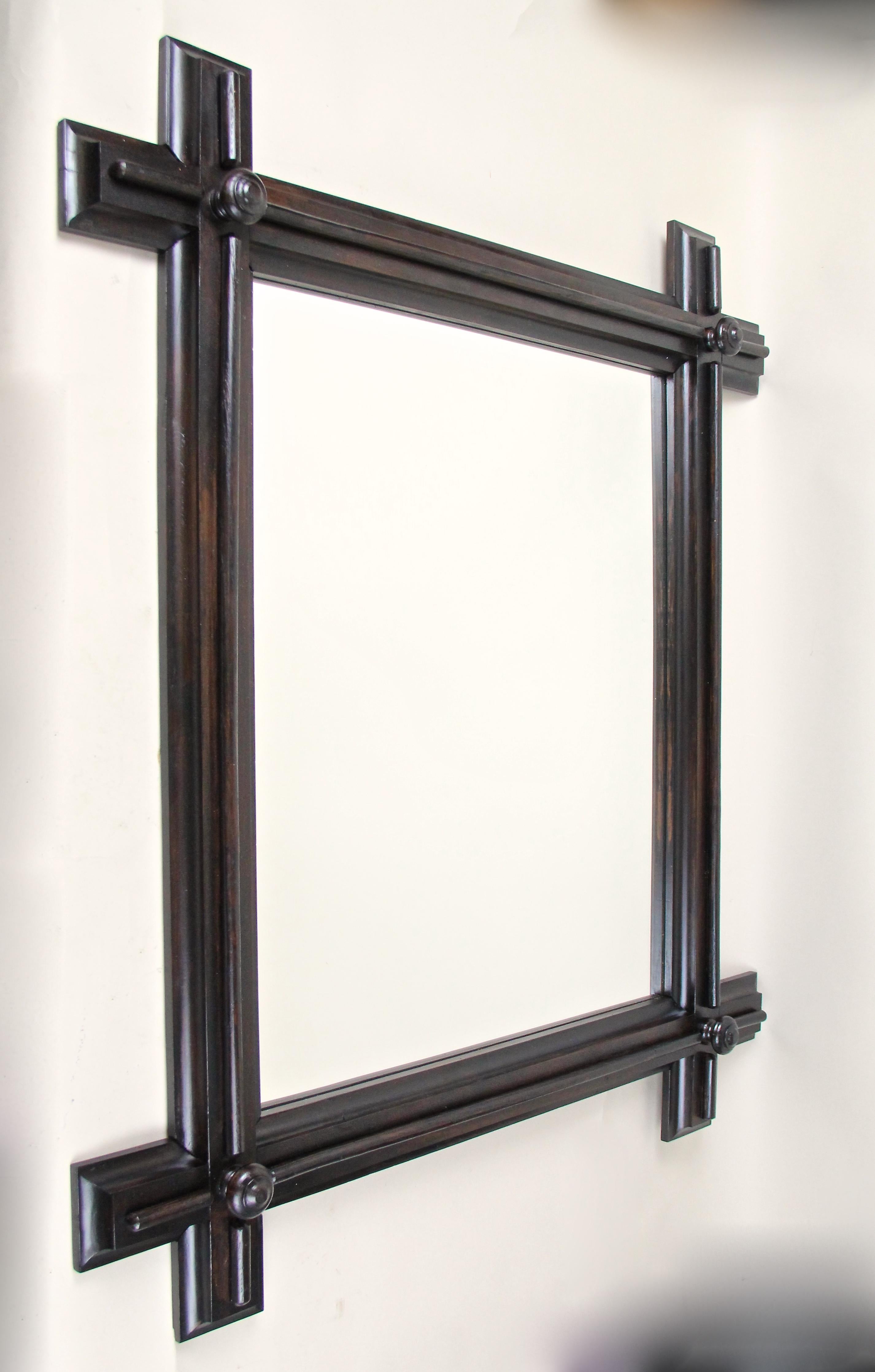Late 19th century wall mirror made of fruitwood coming out of Austria, circa 1890. A simple but fantastic designed wall mirror from the so called 