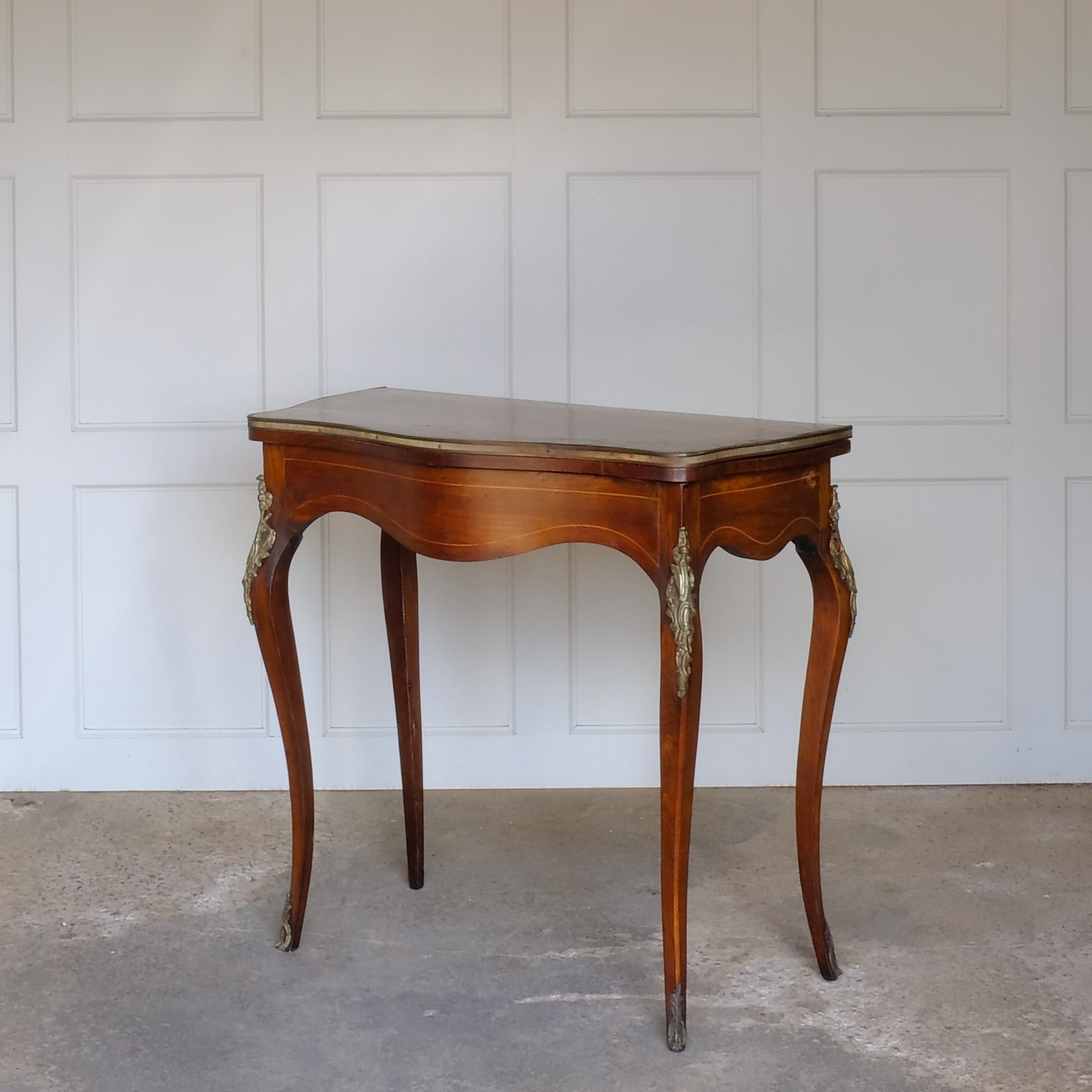 British 19th Century Walnut And Marquetry Inlaid Serpentine Card Table For Sale