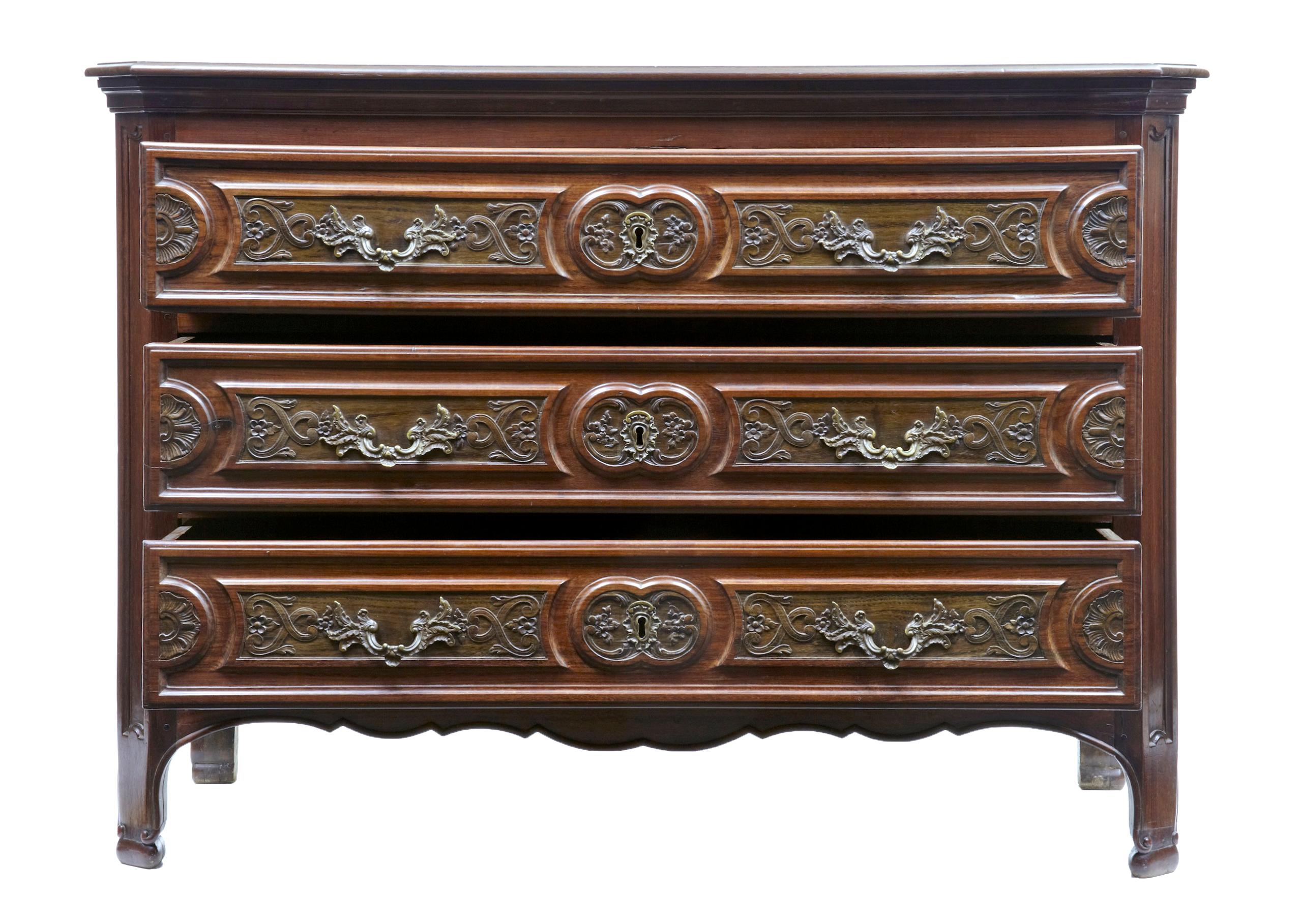 Fine 19th century antique walnut and rosewood French Provincial commode, circa 1860.

Stunning example of a mid-19th century French walnut Provincial commode. 3 drawers with profusely carved in rosewood inserts. Fitted with original ornate handles
