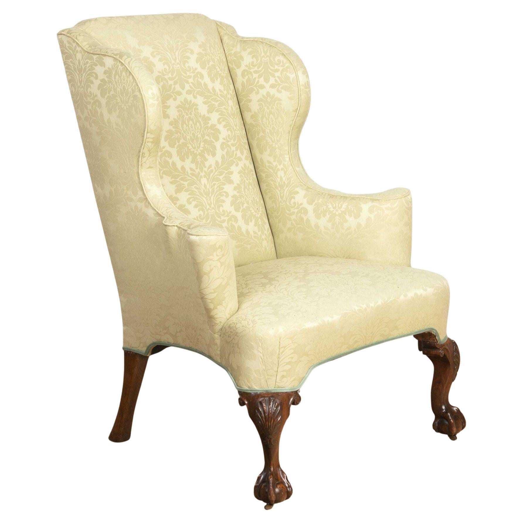 19th Century Walnut Ball and Claw Wing Chair