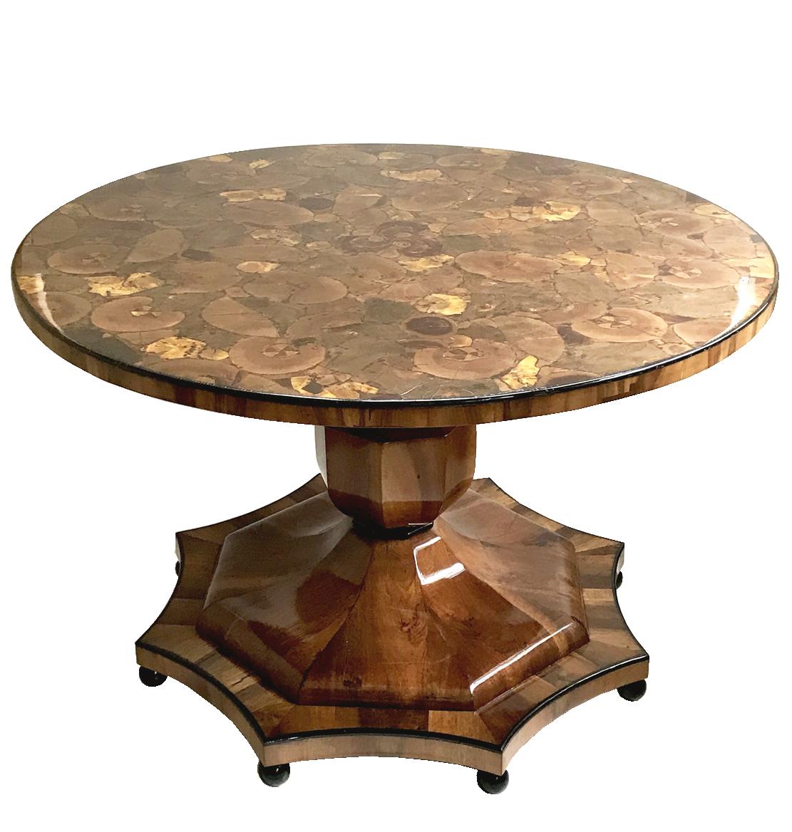Hello,
This exceptional and large Biedermeier walnut table was made in Austria circa 1825.

Austrian Biedermeier pieces are distinguished by their sophisticated proportions, rare and refined design, excellent craftsmanship and continue to have a