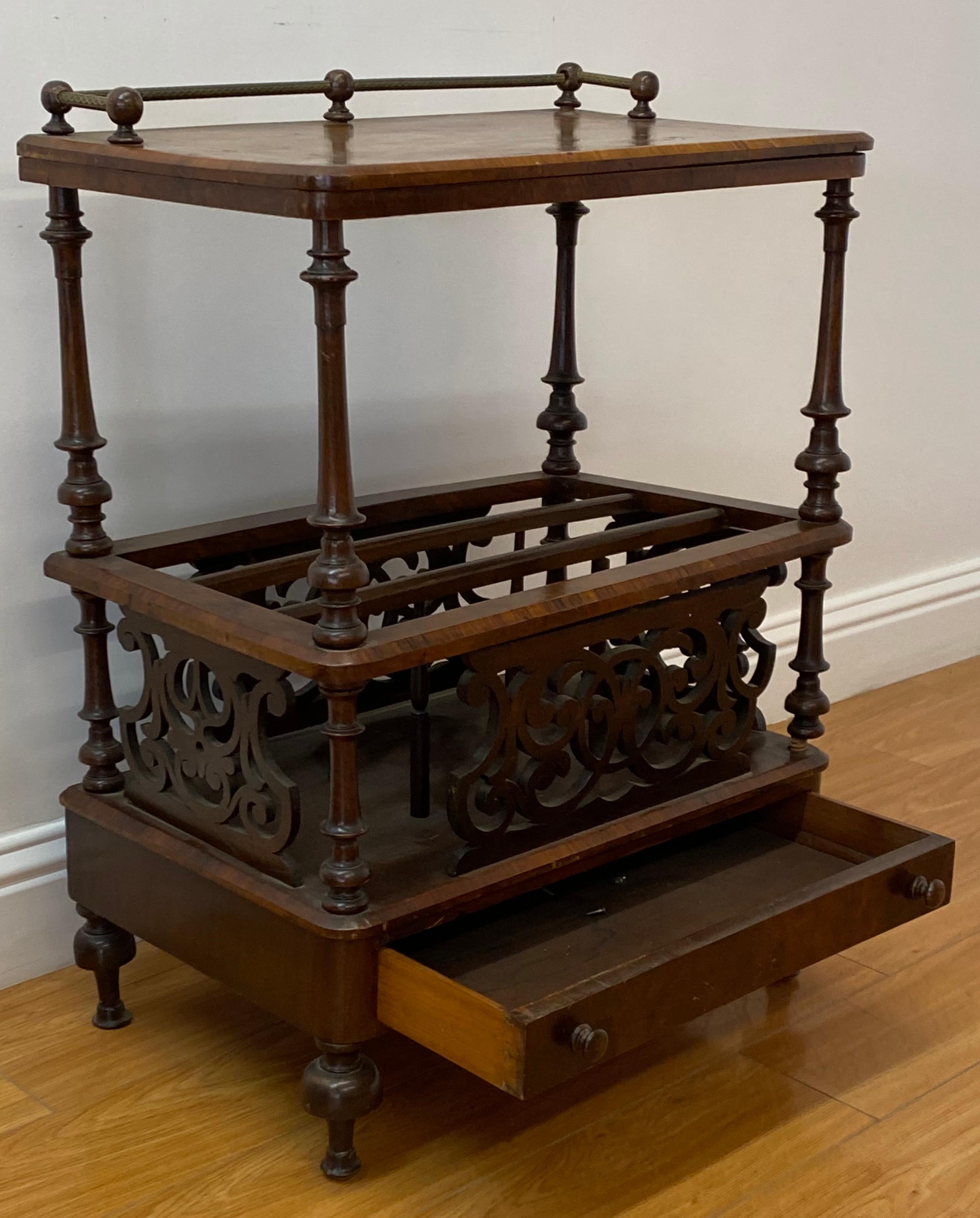 19th century walnut inlay magazine table w/ drawer

Hand carved custom made magazine holder with single drawer below and table on top

Beautiful burl walnut veneer over a rosewood frame and a brass backsplash at the top

Measures: 23