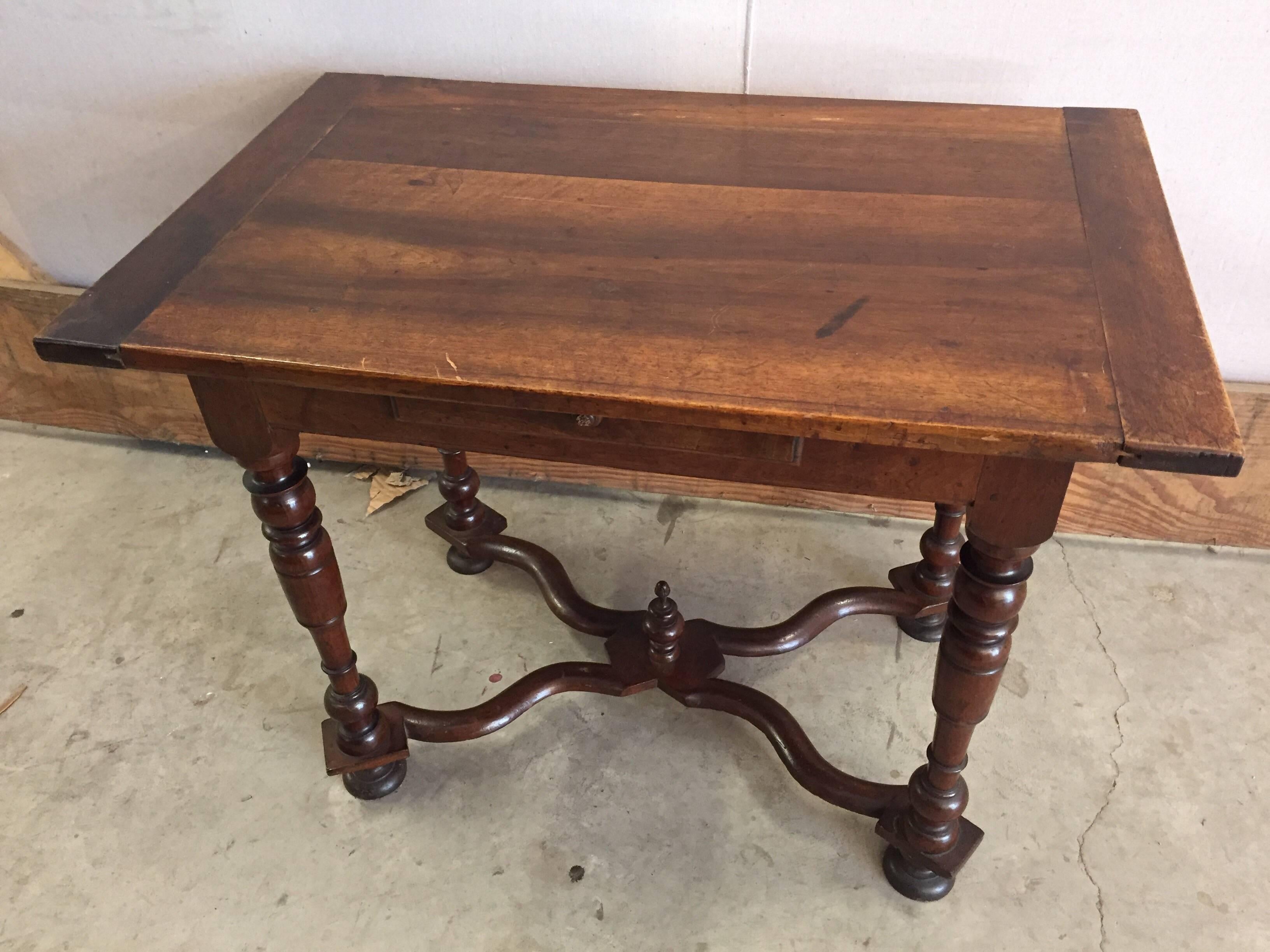 18th century walnut Louis XIV table with one drawer, and rich color with nice patina. Legs and stretcher are
very stable and sturdy.