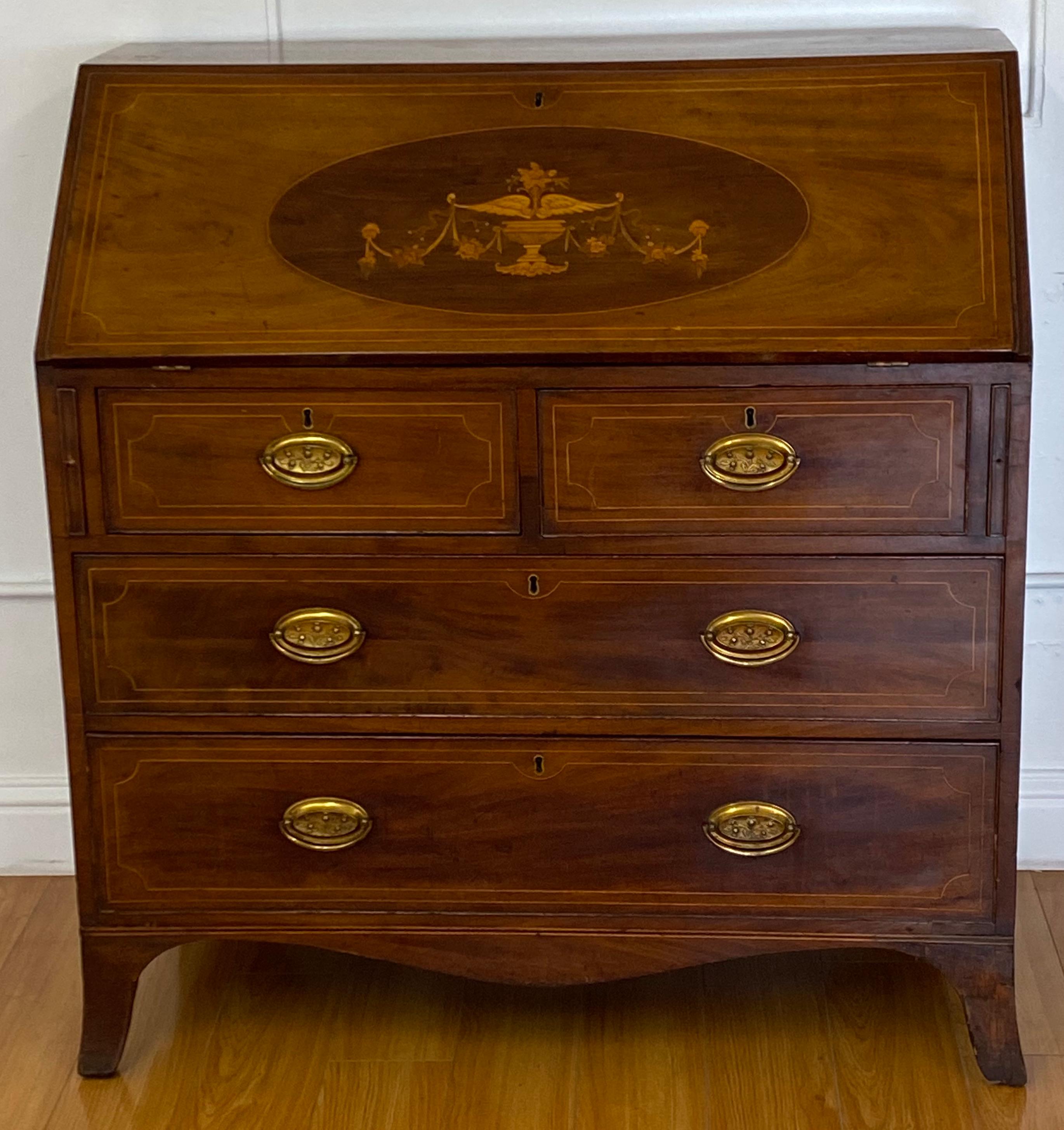 19th century walnut & mahogany drop front bureau desk

Gorgeous antique drop front bureau with fitted interior

The small footprint and large desk surface makes this a great laptop desk for the 21st century

The beautiful inlay work shows a
