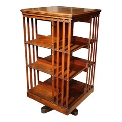Libreria girevole in noce del XIX secolo Maple & Co.