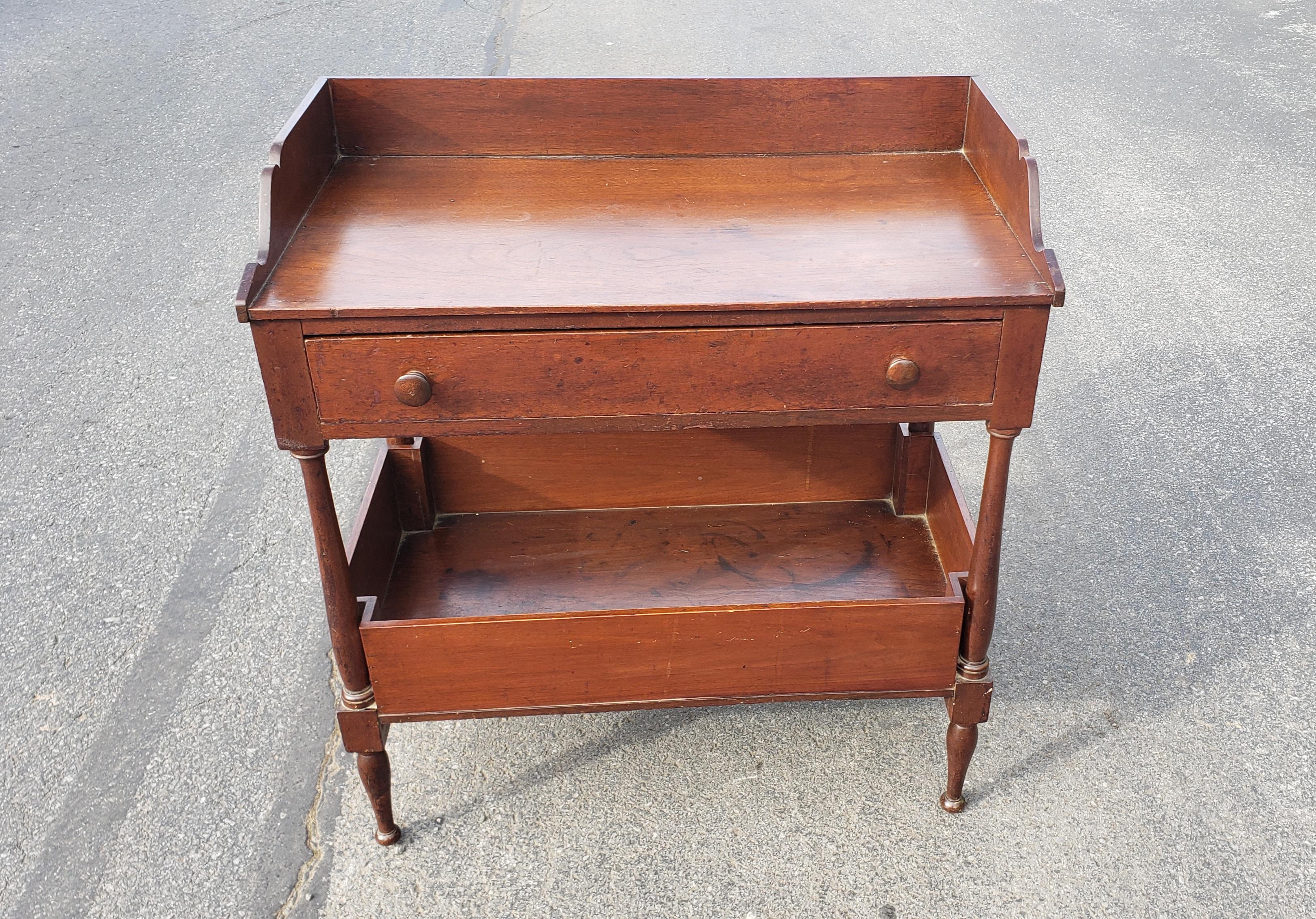 19th century walnut two tier washstand / industrial or work table with divided drawer and spacious open bottom storage.
Measures : 29.5
