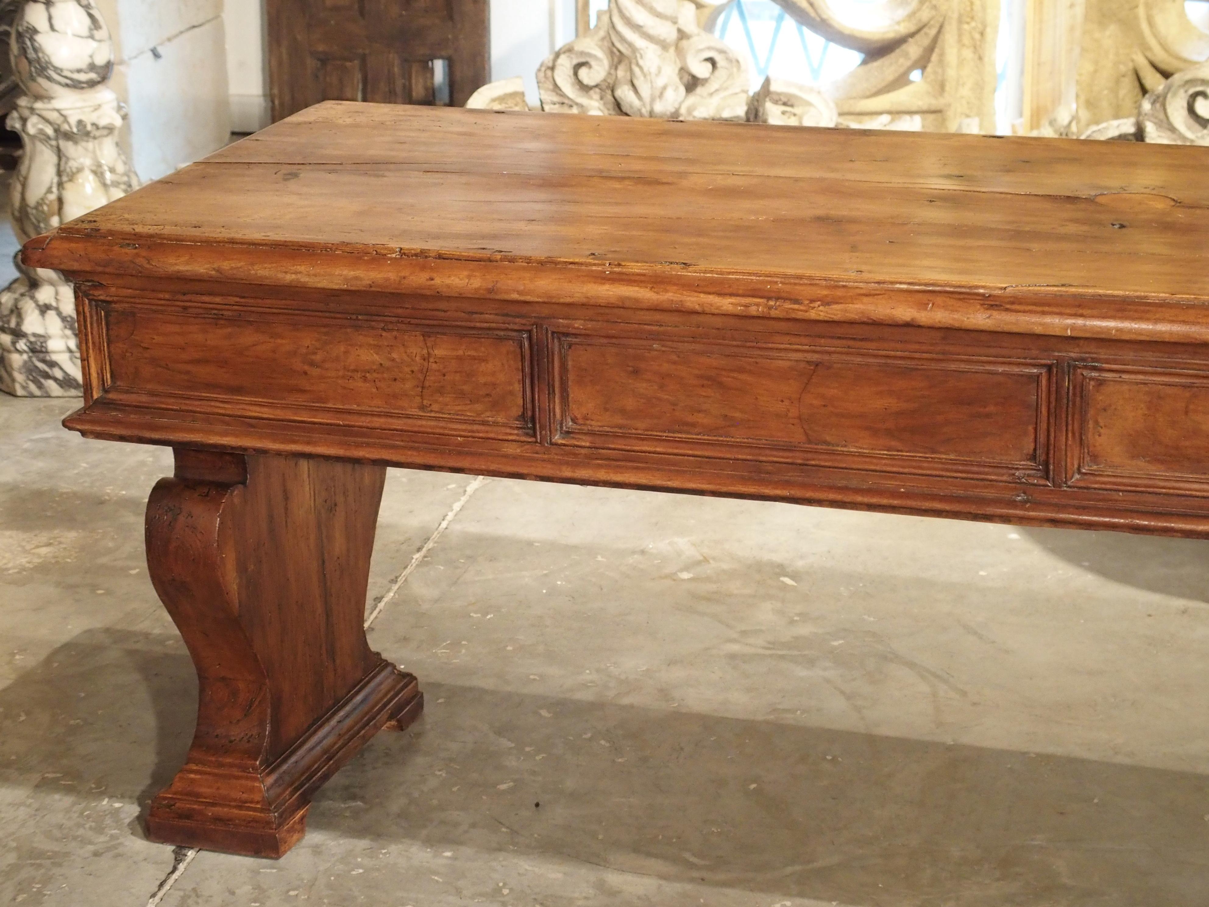 This fabulous walnut wood refectory table from Italy has some beautiful graining. Look at some of the photos of the top plank to see the interesting color and patterns. Refectory table tops were often made from one solid plank of wood, at the most