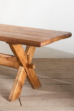 19th Century waney edged pine X frame tavern table