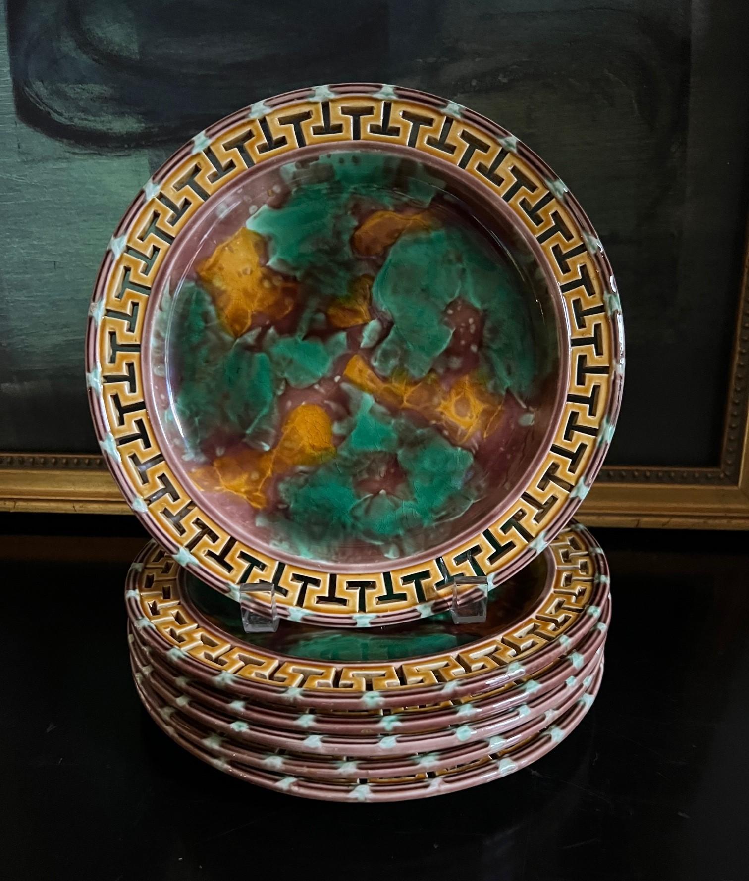 Wedgwood majolica antique plate decorated with a reticulated rim with a tortoise shell style center. Each plate is stamped on the bottom with Wedgwood and includes the impressed mark dating the plates to 1868 as well as the painters marks.

