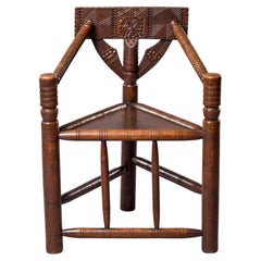 Sillón de esquina de roble de estilo popular galés o inglés del siglo XIX