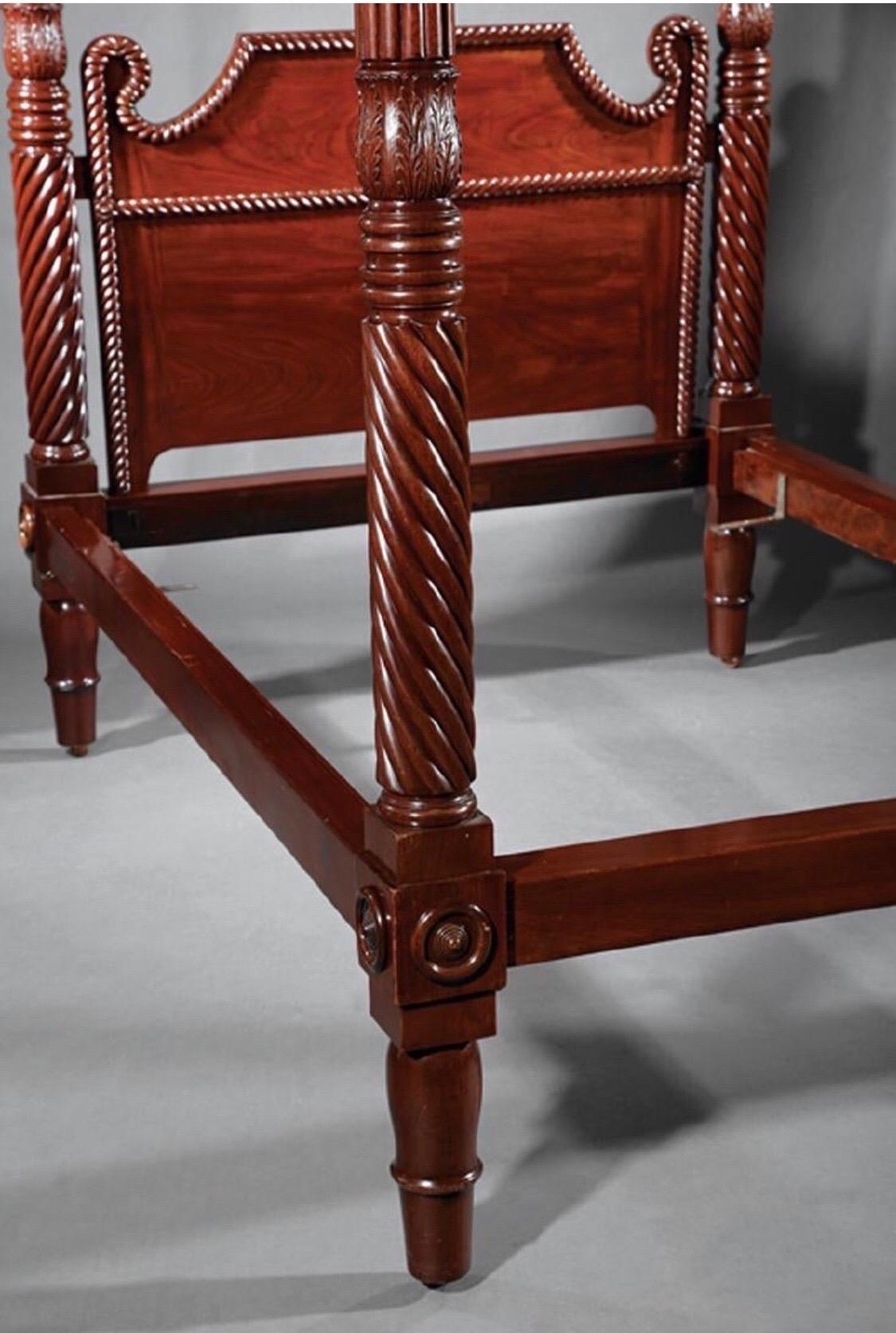 19th century West Indies carved mahogany 4 post bed with acanthus-carved reeded and spiral-turned posts, melon finials, rope-molded paneled headboard, tall turned feet.
         