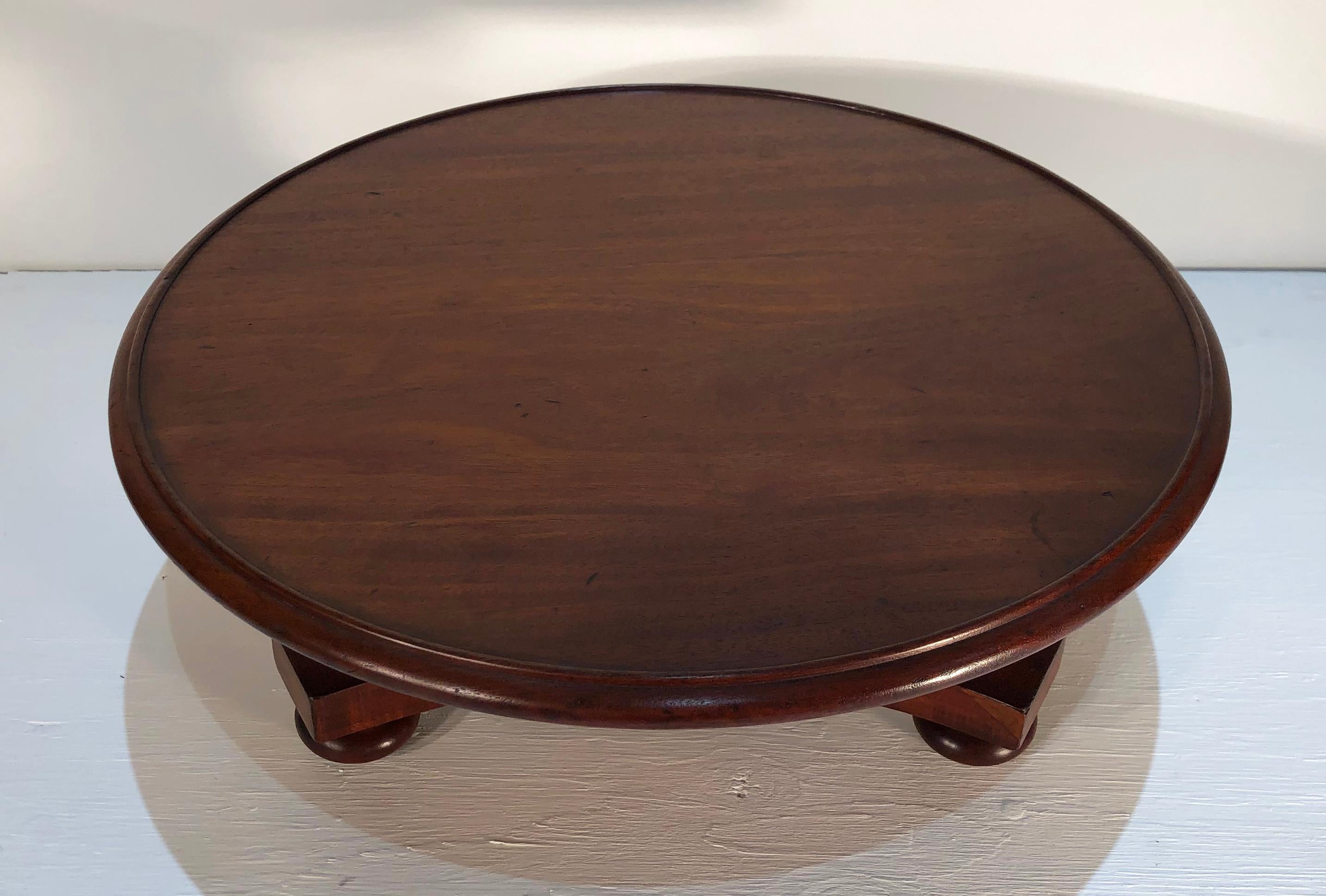Rare 19th century West Indies Lazy Susan made of mahogany, Regency in style. Wonderful tripartite base with central column and reeded collar.