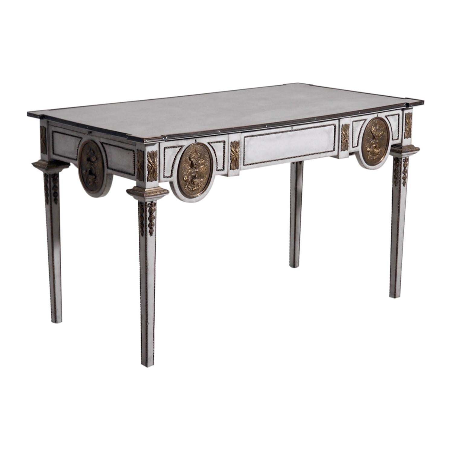 An extendable, antique French partners desk with a white, grey rectangular top, made of hand carved oakwood, in good condition. The writing table is standing on four straight legs, composed with two drawers and one key, very detailed bronze, brass
