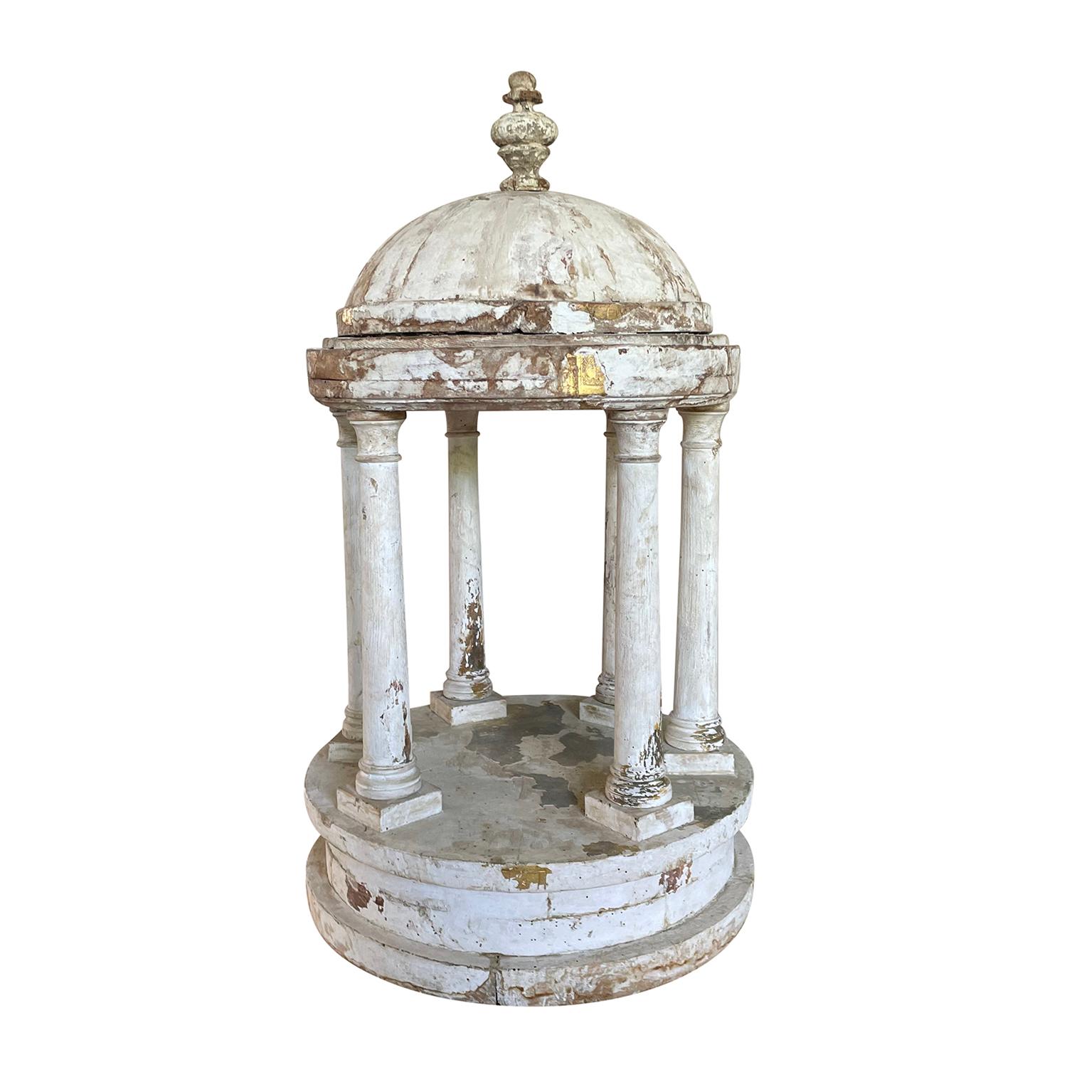 A 19th century, White-grey antique miniature model of a Palladio style gazebo with a domed roof and topped with a small urn shaped finial, columns and circular base. The detailed décor piece is made of handcrafted painted Pinewood, original antique