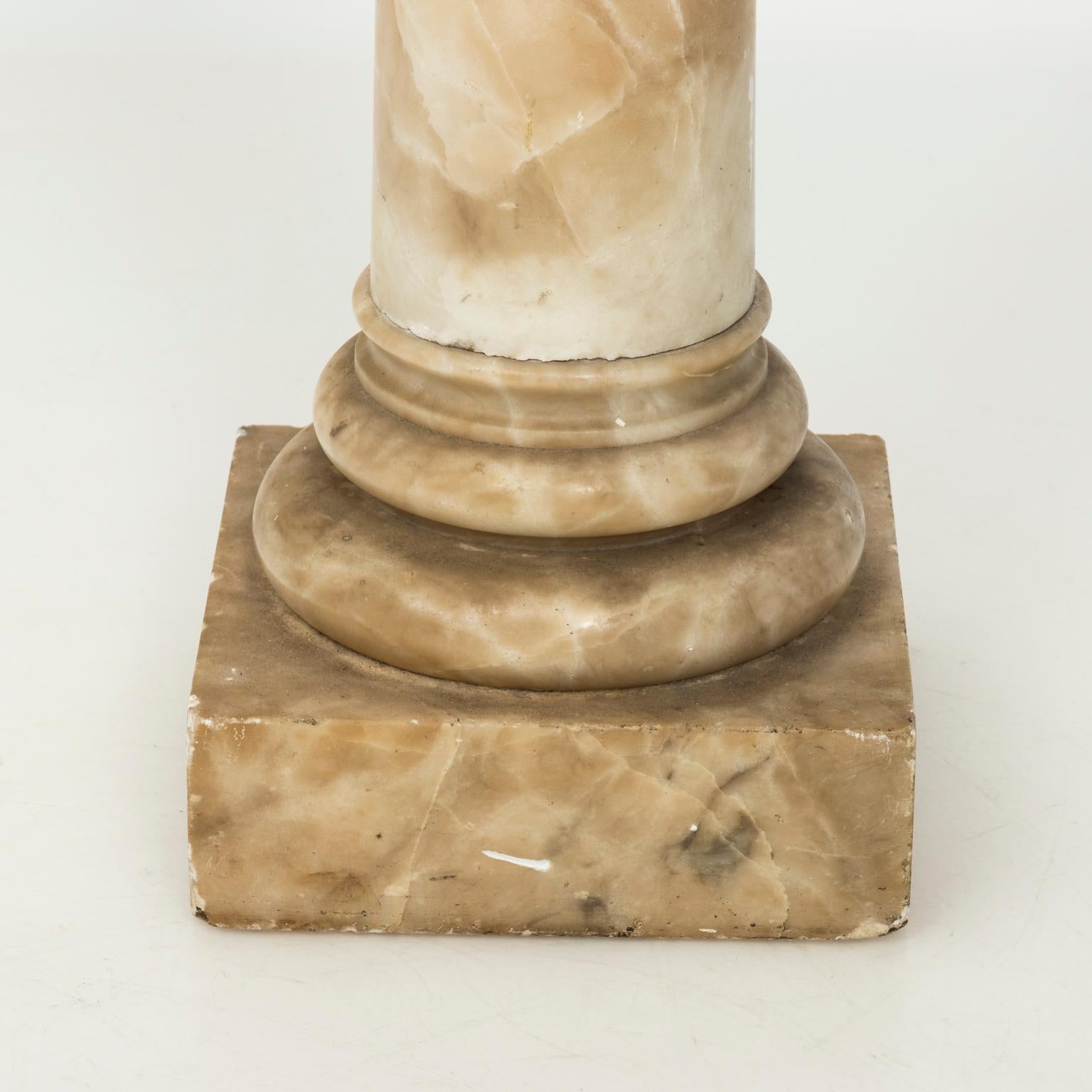 19th century carved white marble pedestal stand with a column base.
 