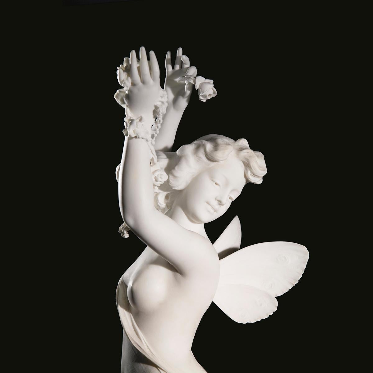 Carved Italian White Marble Figure of a Nude Beauty with Putti