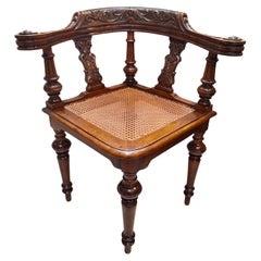 Silla esquinera guillermina de nogal del siglo XIX