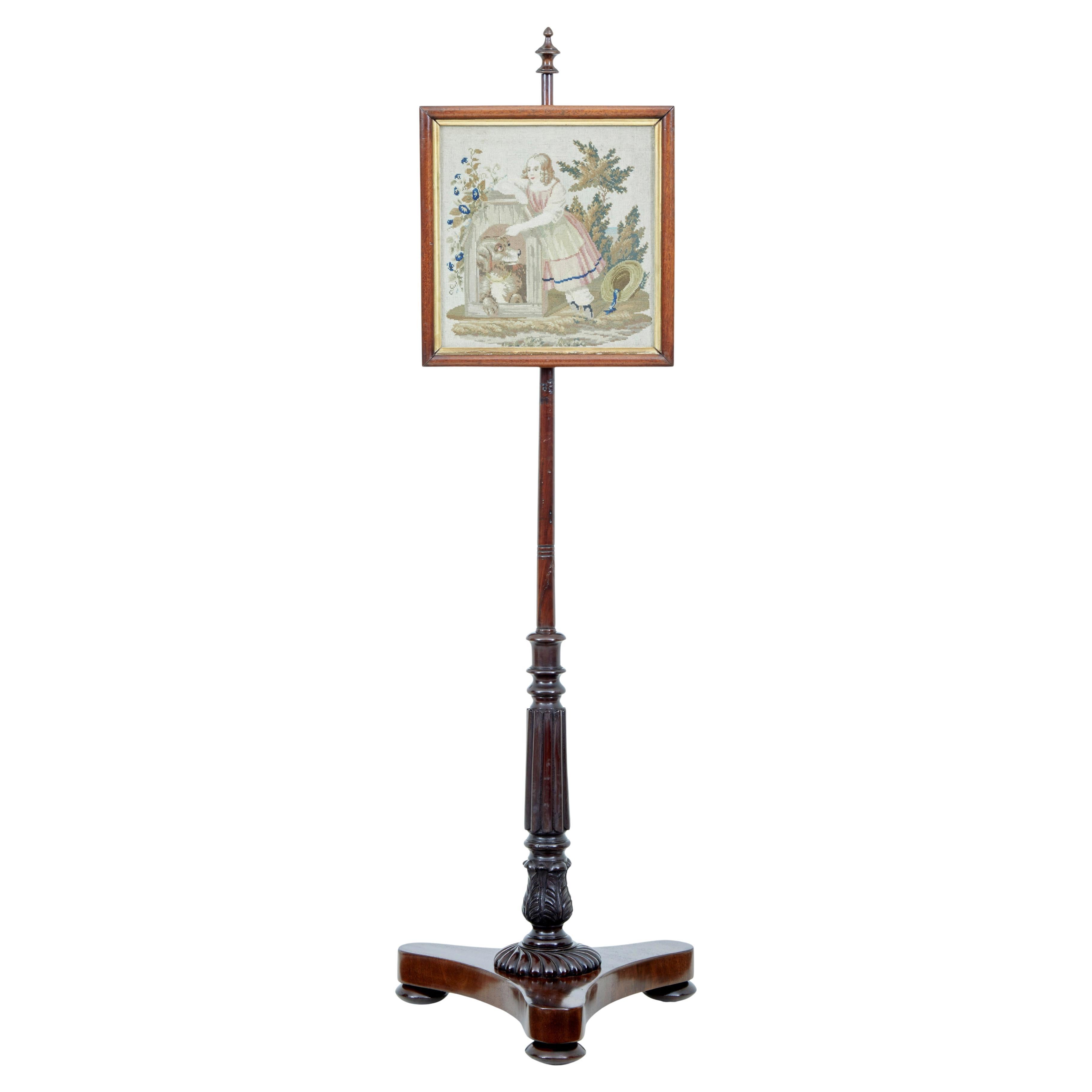 19th century William IV carved mahogany pole screen