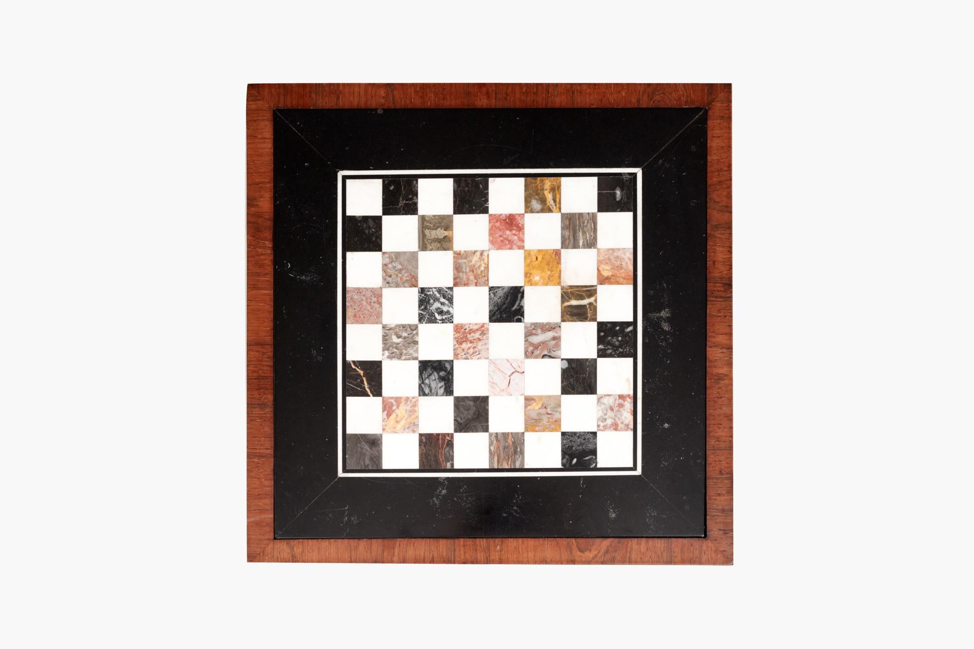 19th Century William IV mahogany chess table with speciman marble top. The mahogany square top, with beaded detailing to the apron, inset with specimen marble games board within a border of black marble. Supported on square column with an incuse
