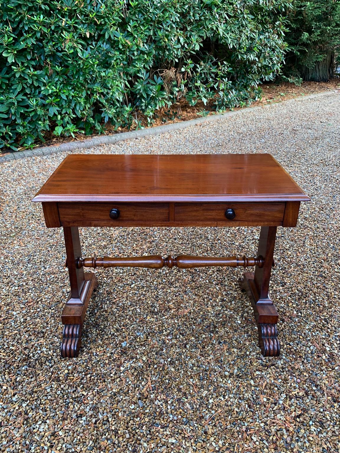 A very high quality 19th Century William IV Mahogany Library Table with two drawers on the front and dummy drawers on the back. Raised on turned supports and carving to feet.

Circa: 1830

Dimensions:
Height: 29 inches – 74 cms
Width: 36