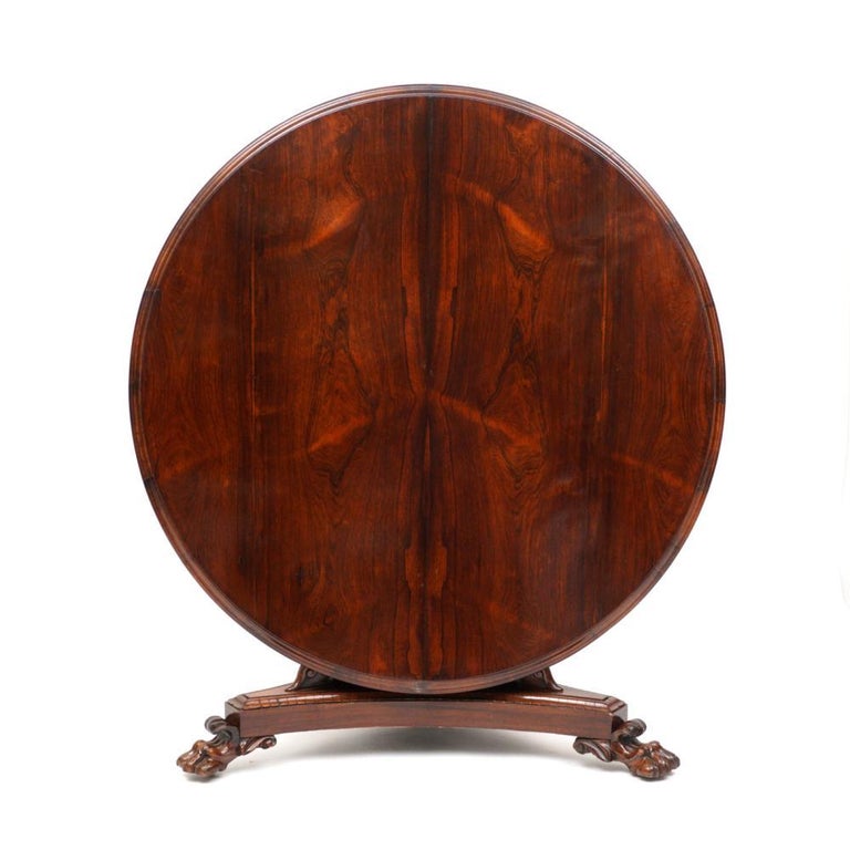 Period early 19th century English rosewood center table or breakfast table of Thomas Hope Pyramidal Form. Tilt top mechanism. Well matched Rosewood. Paw feet. All orginal

Provenance: Asprey, London and New York.
