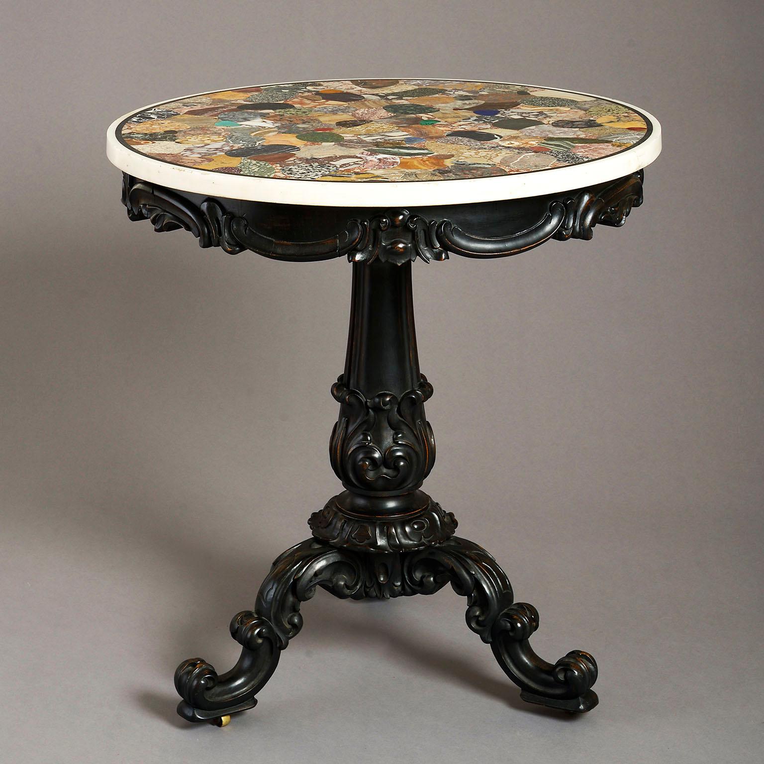 A 19th century specimen marble centre table, the circular top inlaid with a pavement of irregular specimen marbles including, amongst others, Egyptian Alabaster, Carnelian, Malachite, Green Porphyry and Cipollino Verde above a C-scroll carved