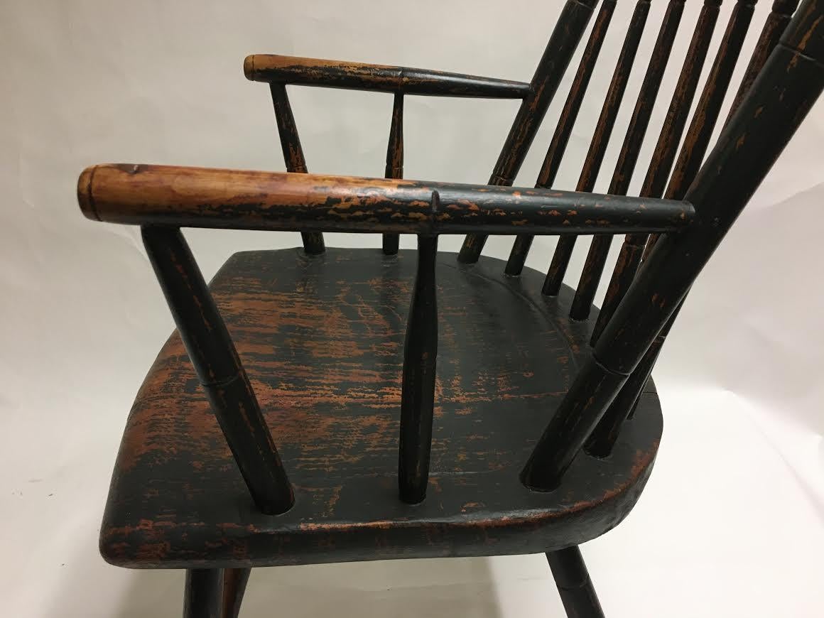 American maple and poplar Windsor armchair in a slightly petite size. Retains the original milk paint with great patina. Very sturdy.