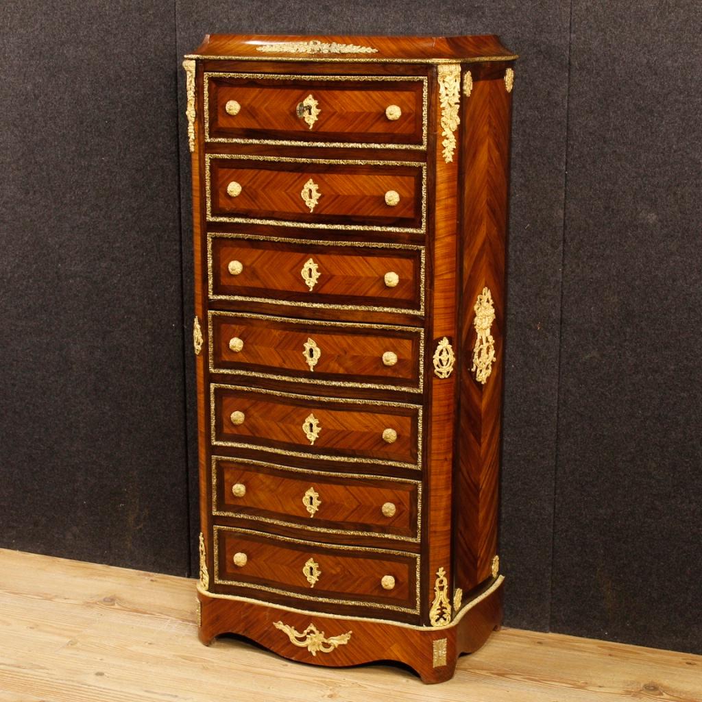 French secrétaire from late 19th century. High quality furniture in rosewood, walnut, palisander and mahogany wood, richly decorated with chiseled and gilded brass and bronze. Secrétaire complete with a working key equipped with four external