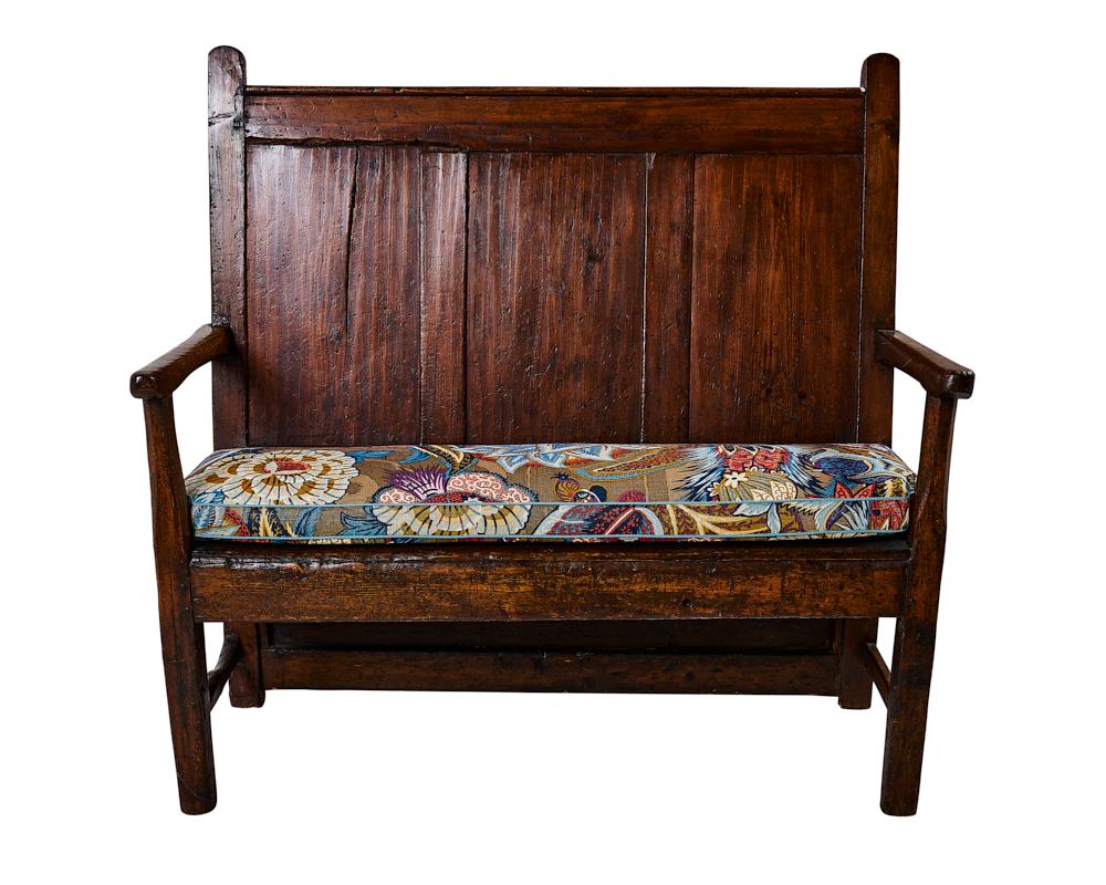 This 19th Century English wood bench includes a cushion made from Schumacher Zanzibar Linen Print fabric (173520). 