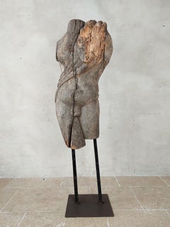 19th century wood carving of a male torso