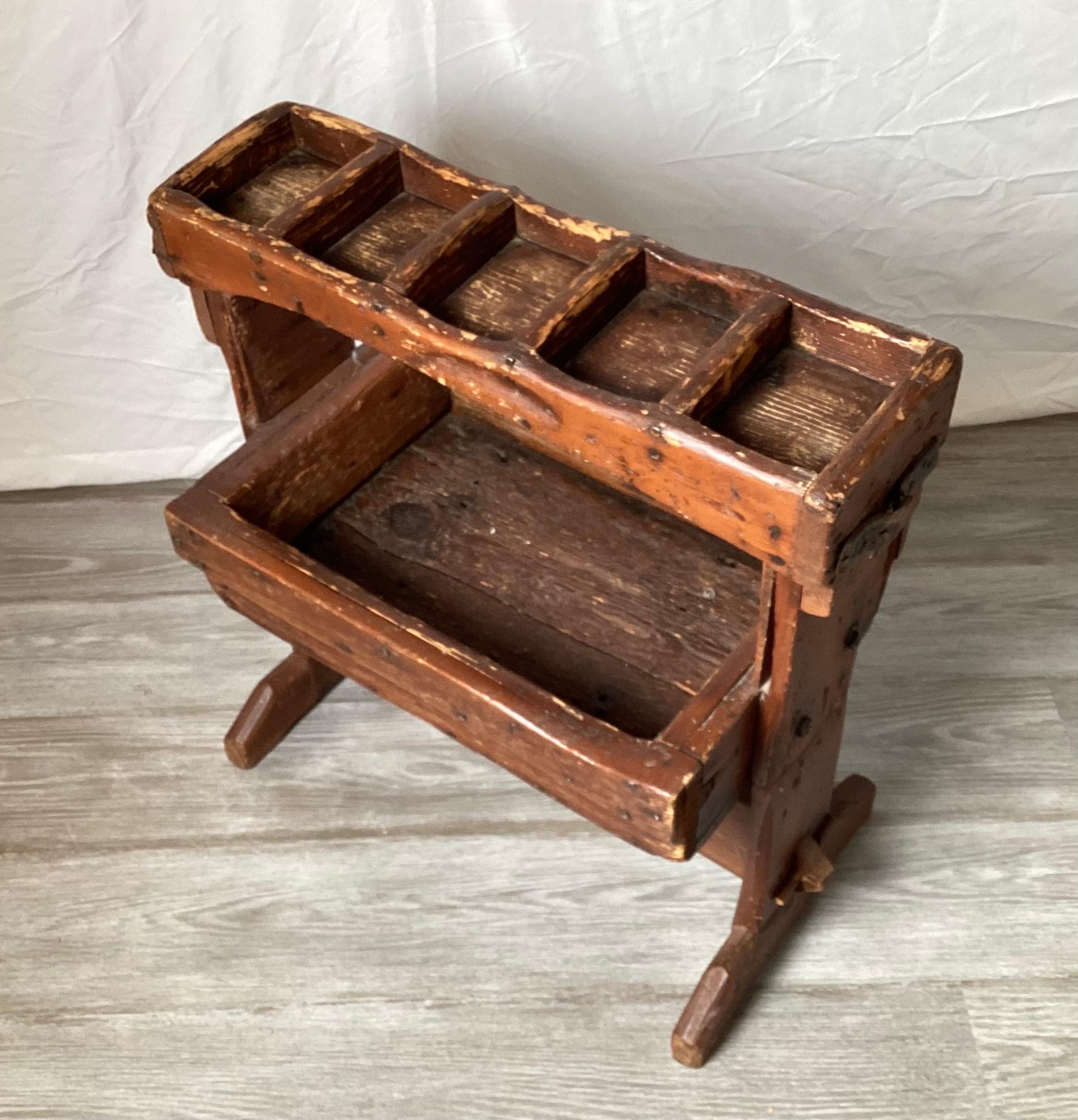 A 19th century original cobblers bench, rack. This was a functional working mans portable work bench with worn old finish with lots of well used wear.