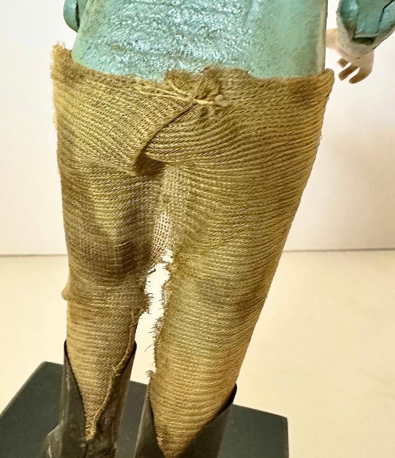 19th Century wood Santos of a boy/child with glass eyes and articulated arms. For Sale 7