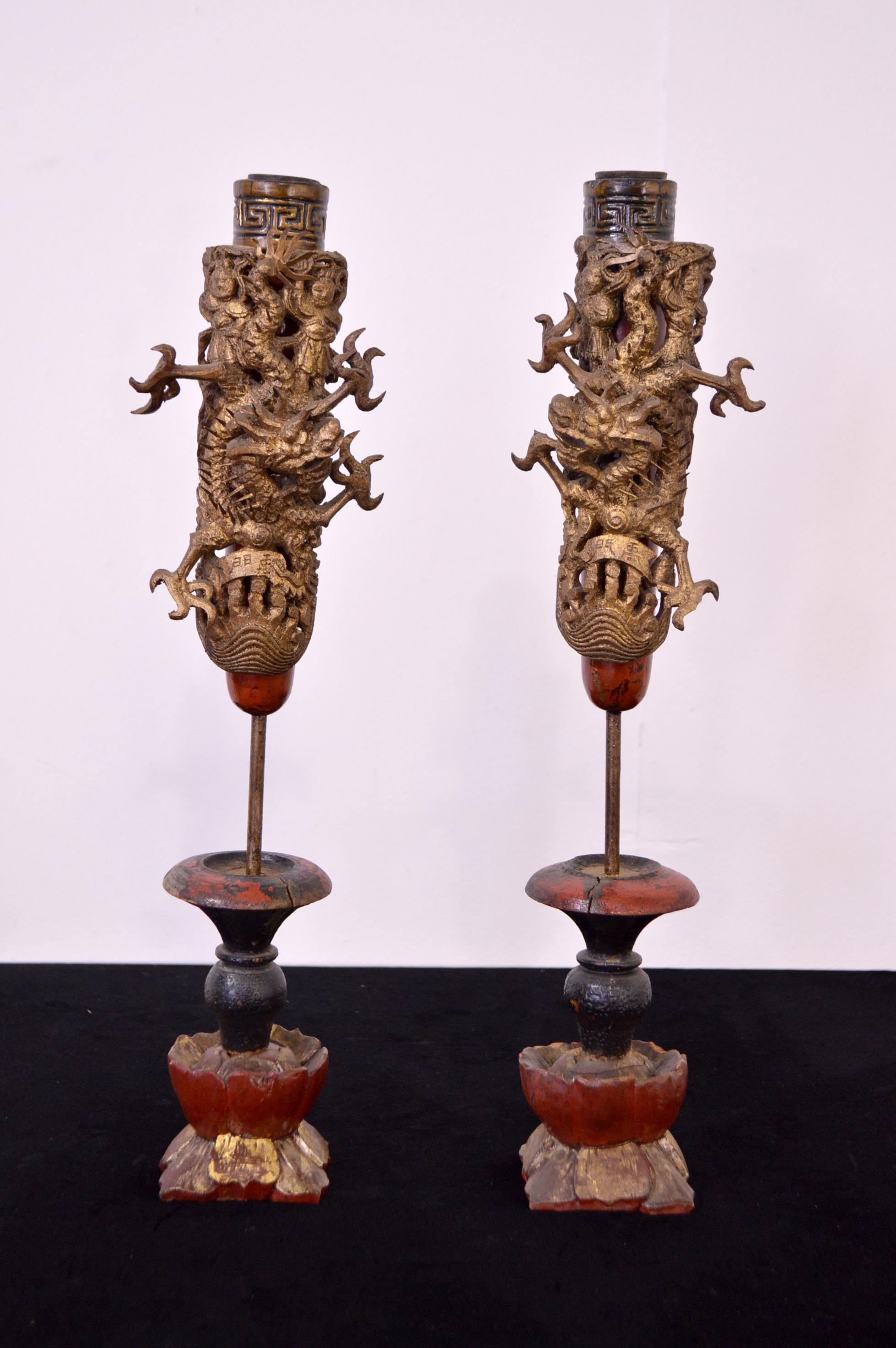 Pair of light wooden candleholders hand-carved.