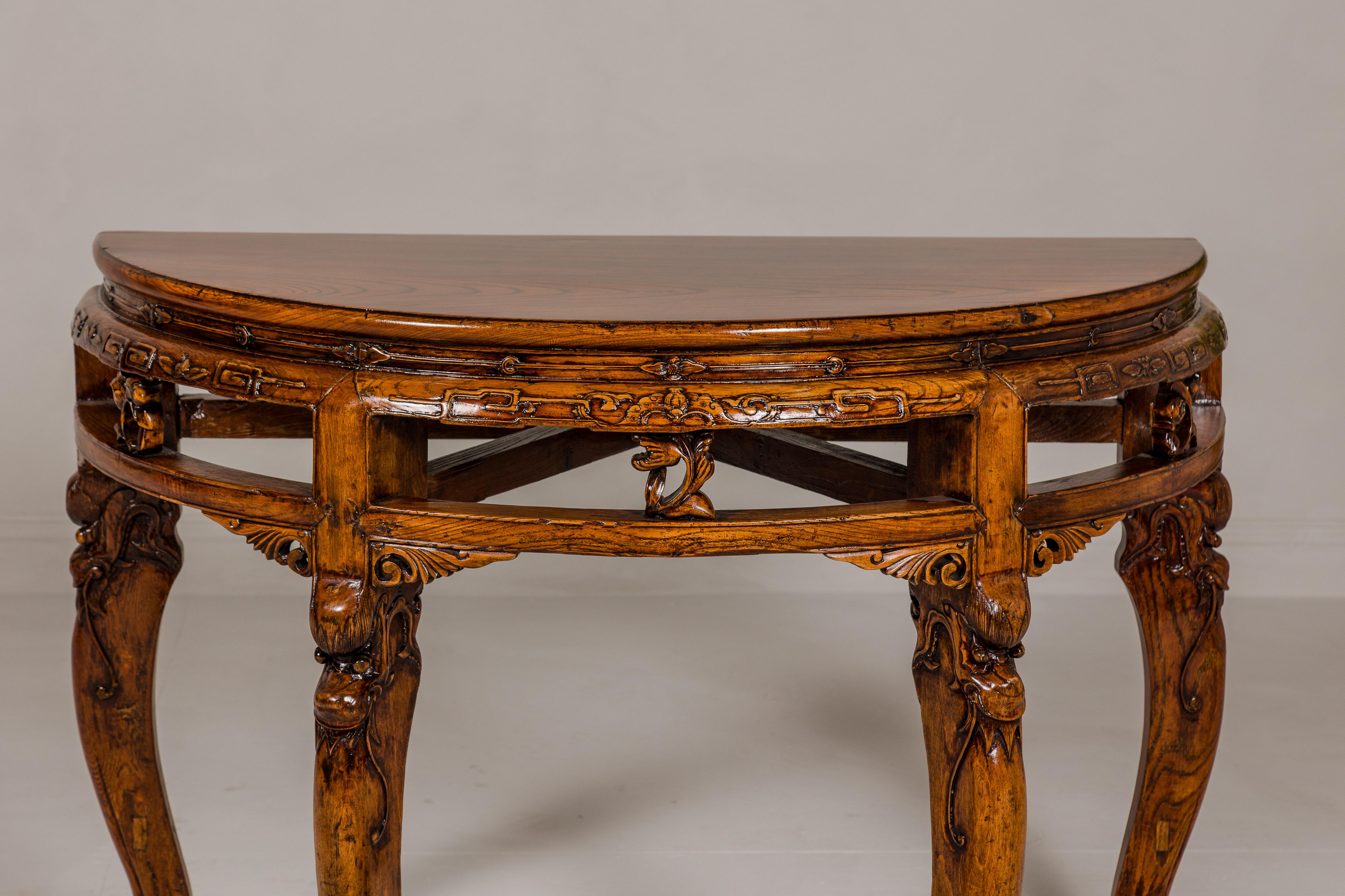 Chinese 19th Century Wooden Demilune Table with Carved Mythical Creatures For Sale