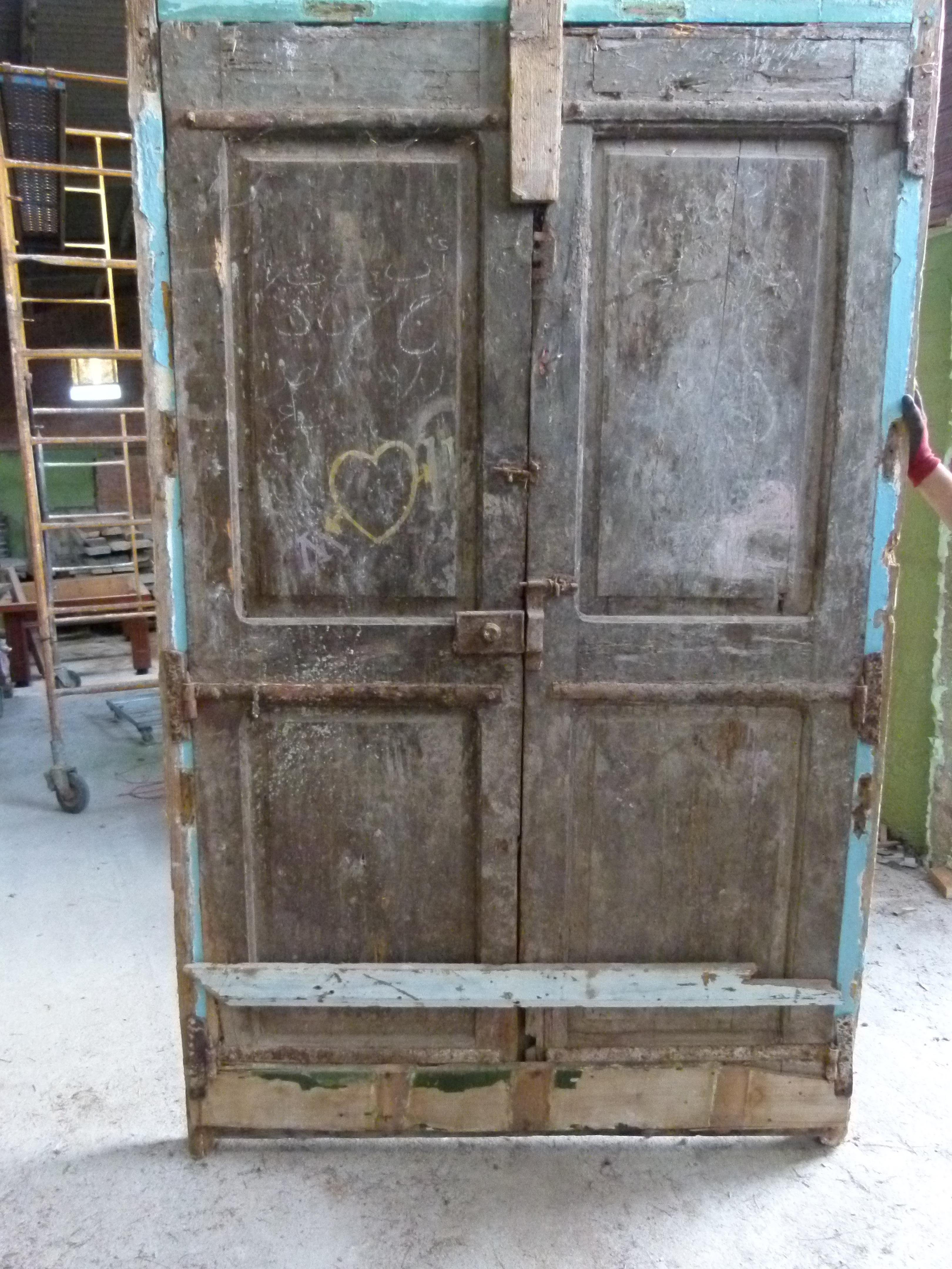 19th century double front door with patina in Art Nouveau style from Catalonien, Spain.
Carved wood typical from this period.
The door is framed and working but needs some restoration as some parts are damaged.
The original patina of the door and