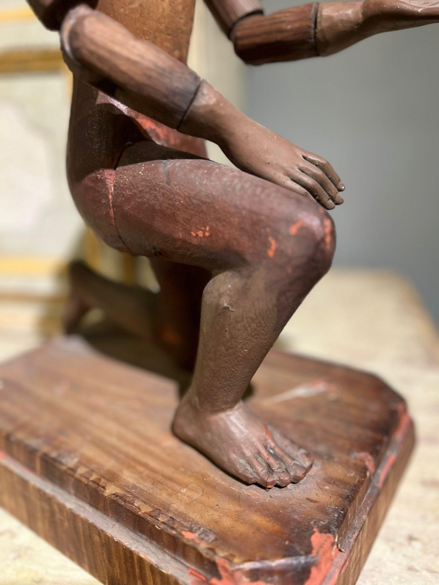 Wooden mannequin depicting a male figure in adoration, glass eyes, 19th century.
Dimensions: 20x29x47cm.