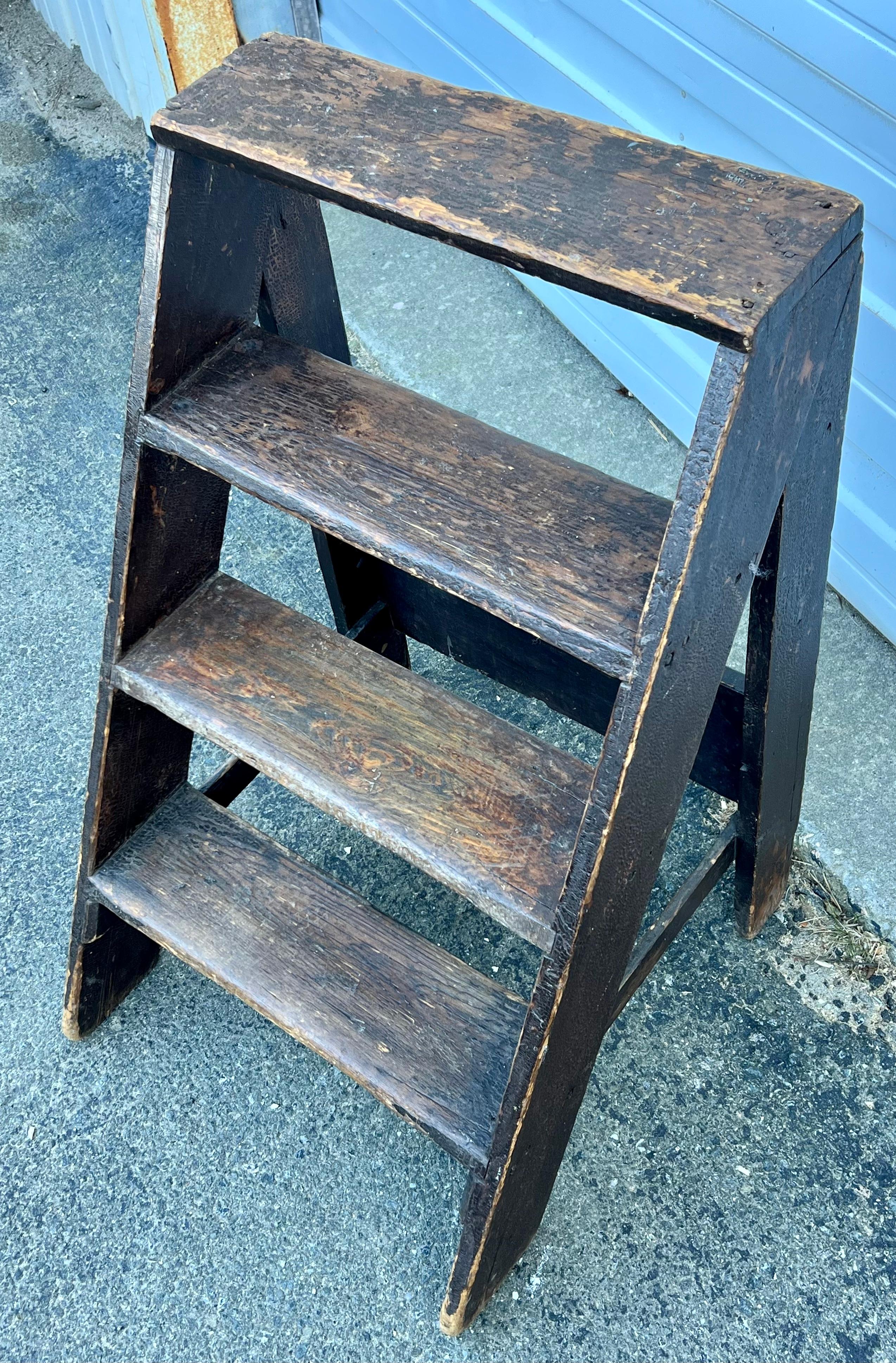 Late 19th century four step wooden stepladder with original surface.  