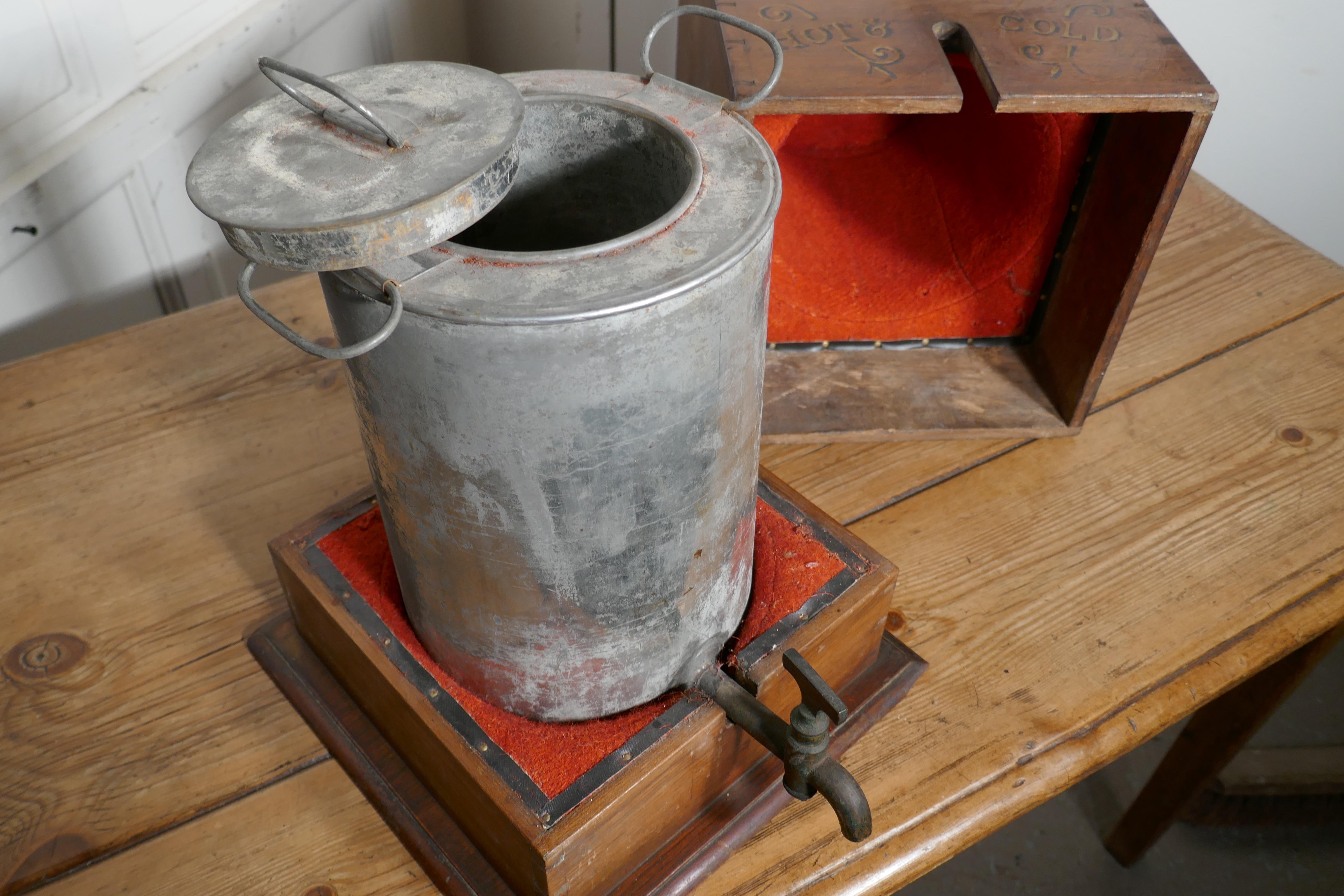 19th century wooden thermos field kitchen food warmer, 


This is a very old thermos food warmer, it is a wooden box with a brass tap at the bottom and a small brass handle on either side, ideal for a picnic or shooting party 
The wooden box is