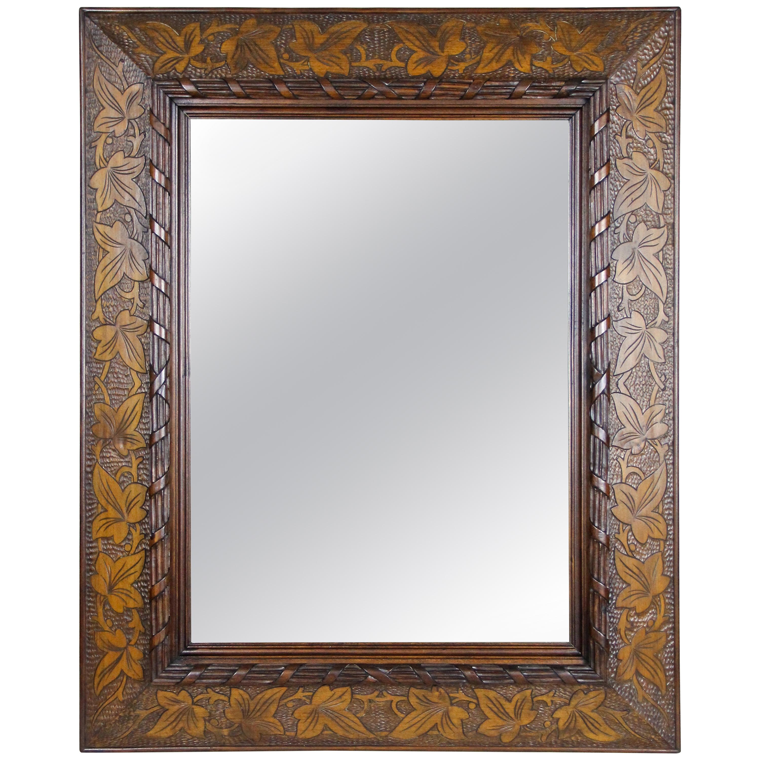 19th Century Wooden Wall Mirror with Ivy Leaf Carvings, Austria, circa 1890 For Sale