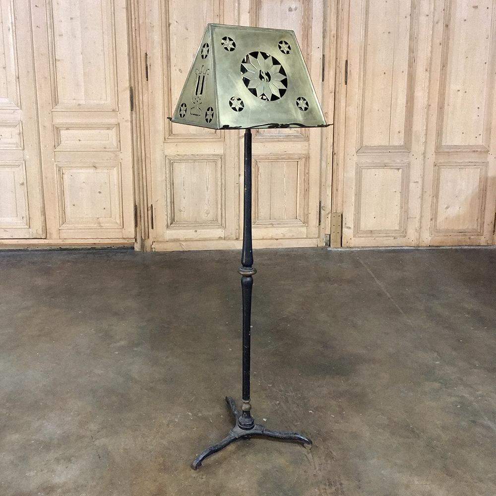 19th Century Wrought Iron & Brass Music Stand is a splendid example of hand-craftsmanship, with a sturdy (and heavy) forged iron base with tripod legs supporting the solid brass two-sided book or music stand above.  The brass stand is designed to