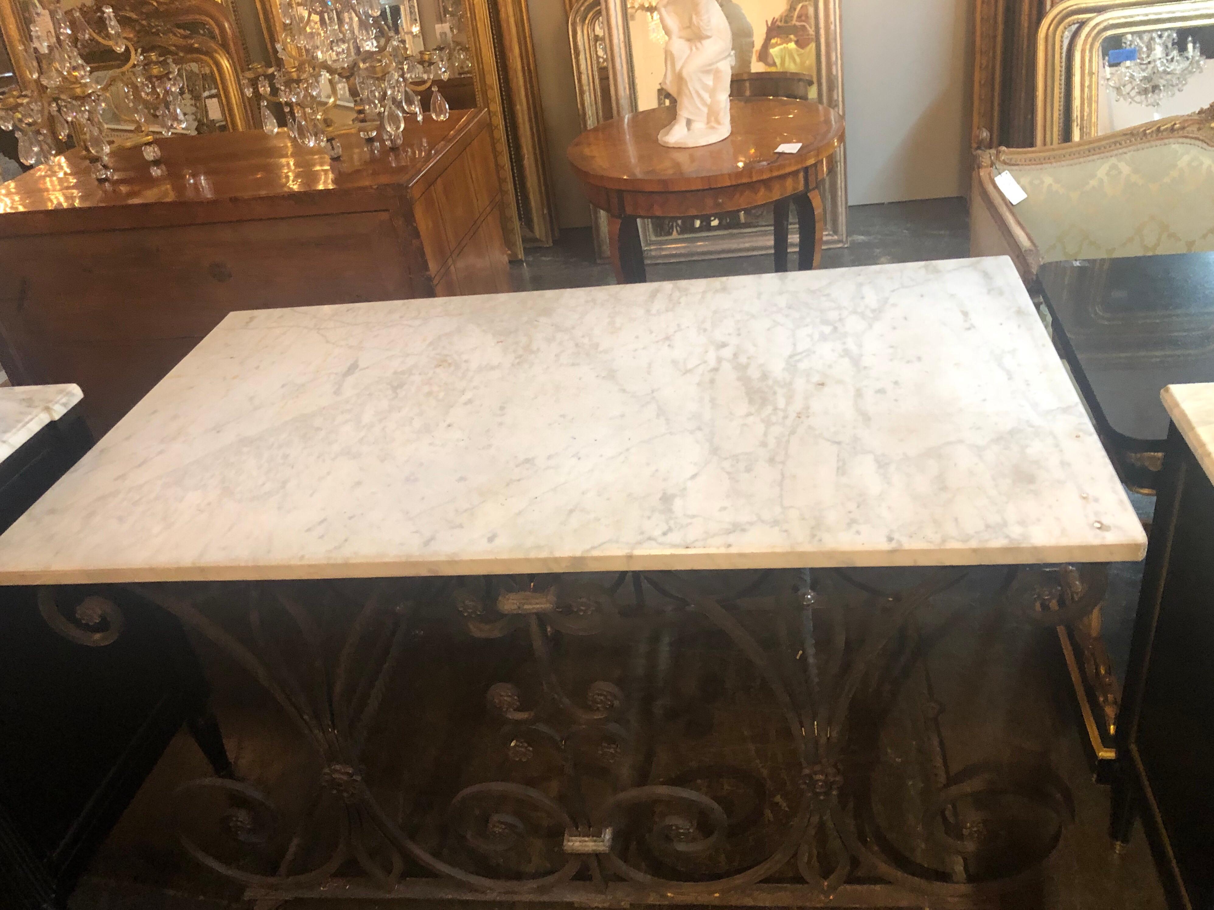 Gorgeous 19th century French wrought iron baker's table with Carrara marble top.
This table is functional as well as beautiful.