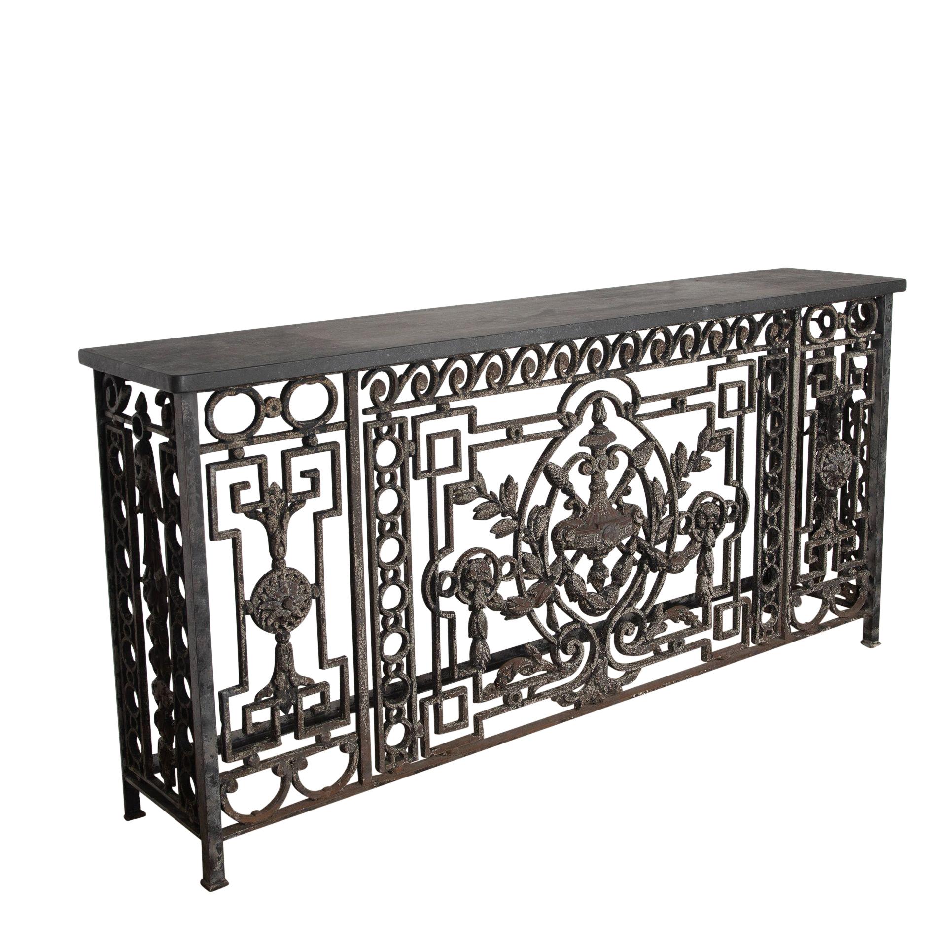 Decorative 19th Century wrought iron balcony console table with original patina and blue slate top.
Originating from Belgium, one of a pair is available.
Circa 1840.